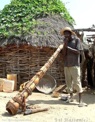 A tribesmen performs on a Wazza, (A... - Sudanese Culture