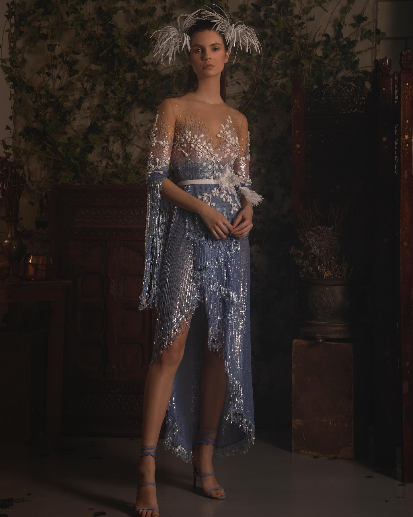 silk and tulle dress Draped sheer in gold foiled tulle, built in gloves, a floor sweeping scarf in bra cups and vertical boning Adjustable tulle spaghetti straps Back zipper Slit on the left front of the skirt Full JEWEL Wedding Dress | Glitter