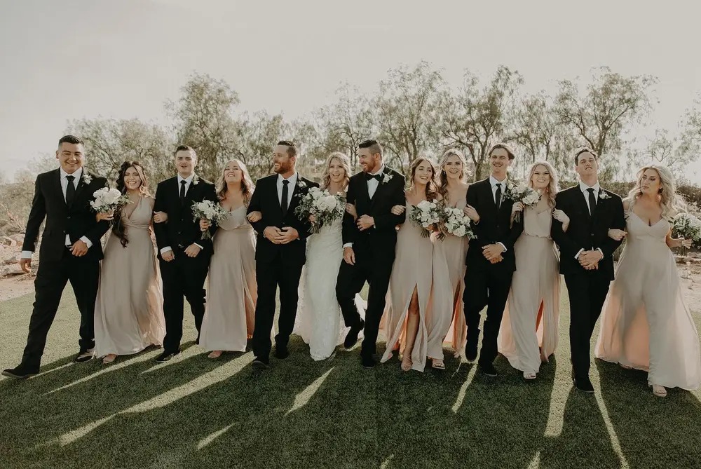 If you've used the chiffon taupe bridesmaid dresses, please post pictures with the groom and groomsmen in their tux/suits! Trying to decide which color suits for the guys!