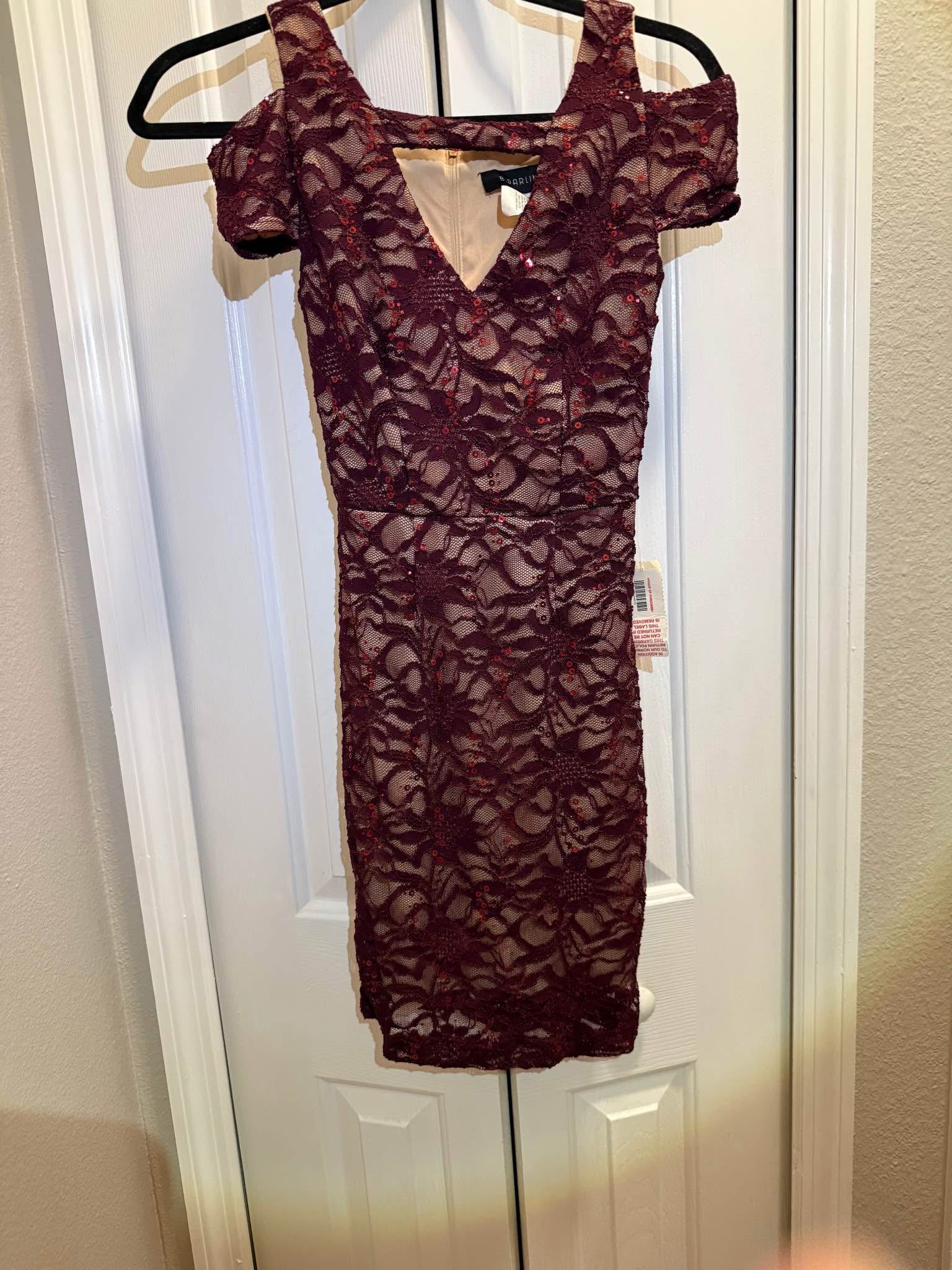 maroon homecoming dress dillards new with tags never worn. B.Darlin size 1/2. sequin lace OBO homecoming dress