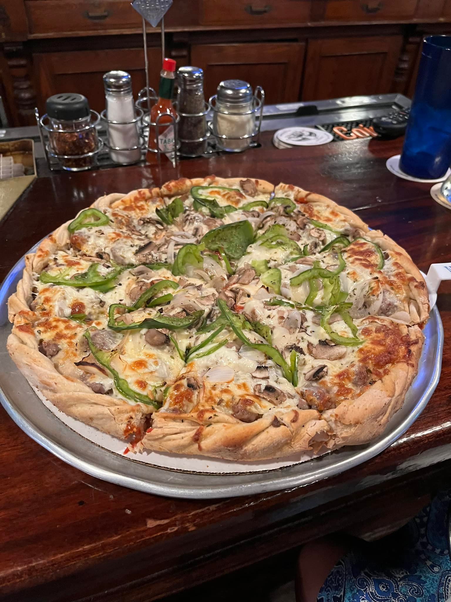 Nick's special double decker pizza with sausage and mushrooms