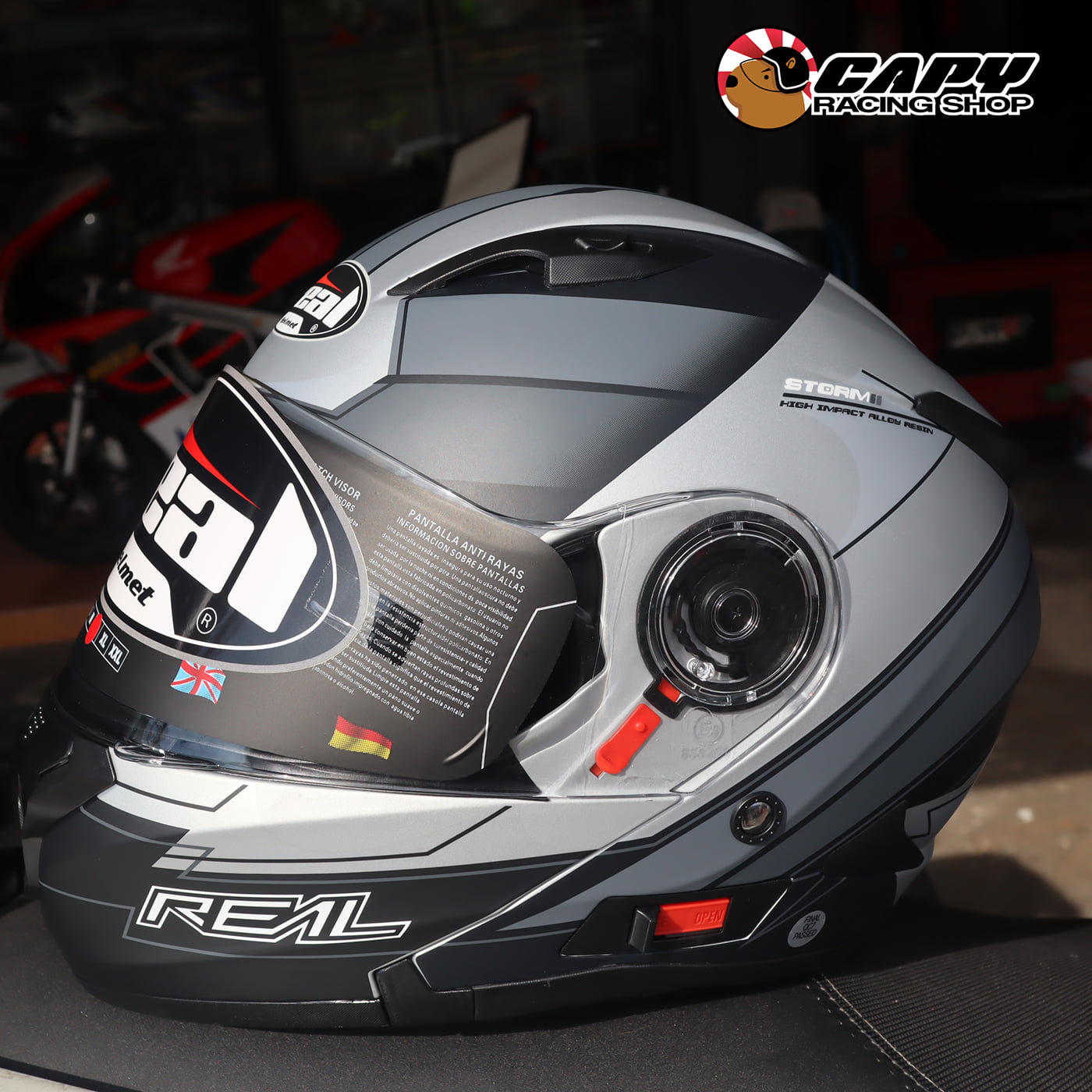 Real Helmets : Storm ดำ-เทา... - Capy Racing Shop หมวกกันน็อค