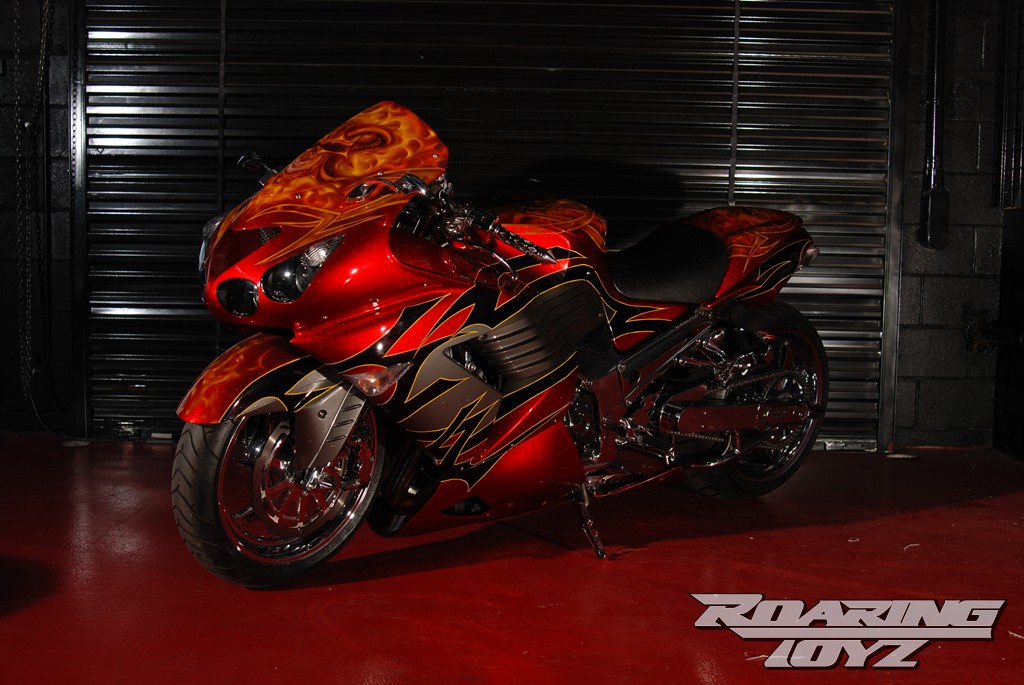 He's got this beautiful ZX-14 strapped down tight!