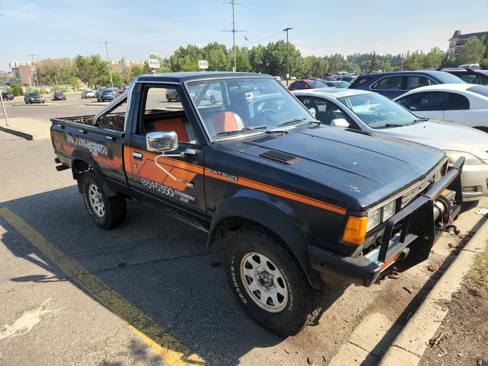 Datsun 720 slam truck conversion with custom seating