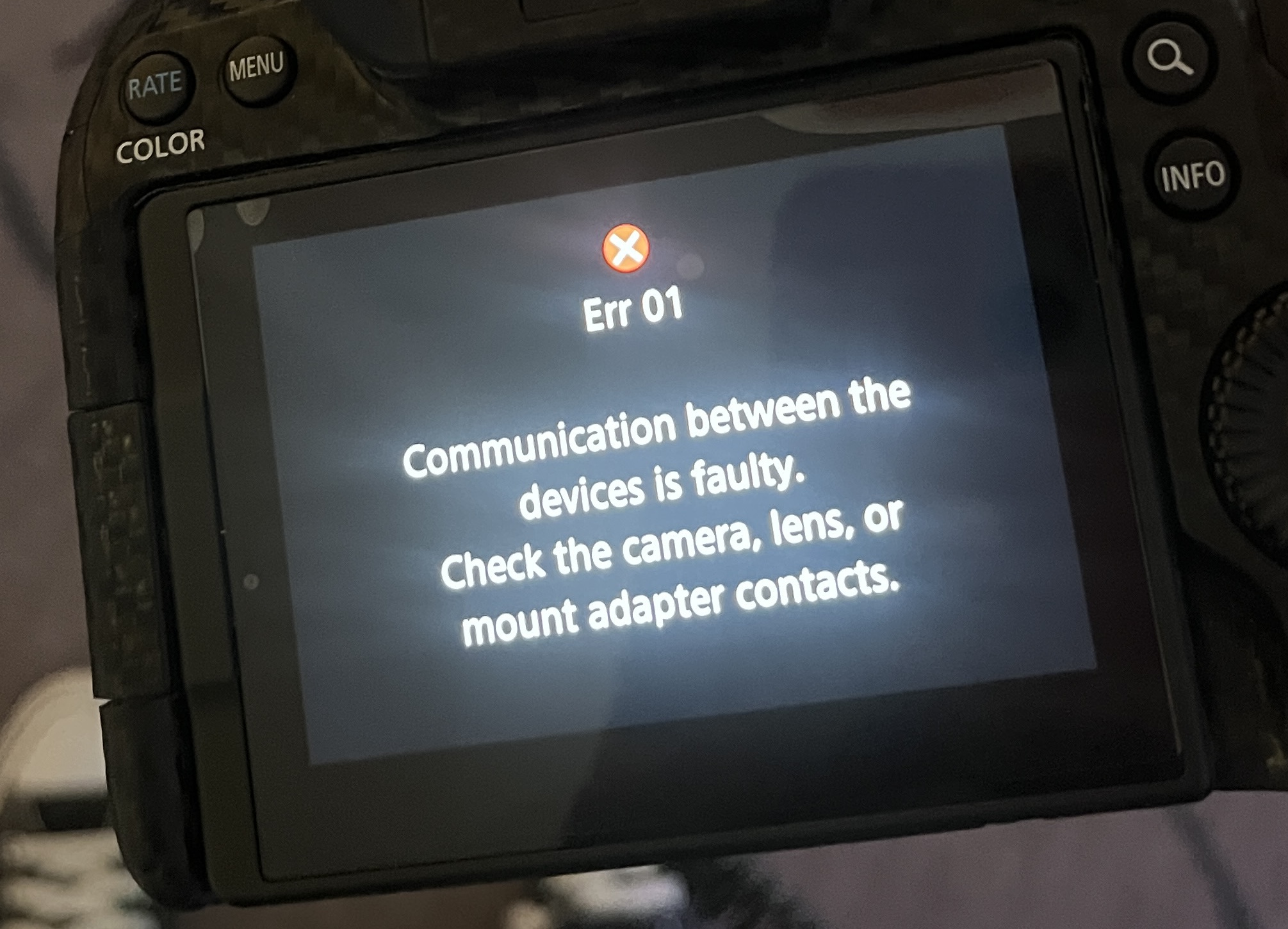 Why does my EF lens cause Err 01 on my camera?