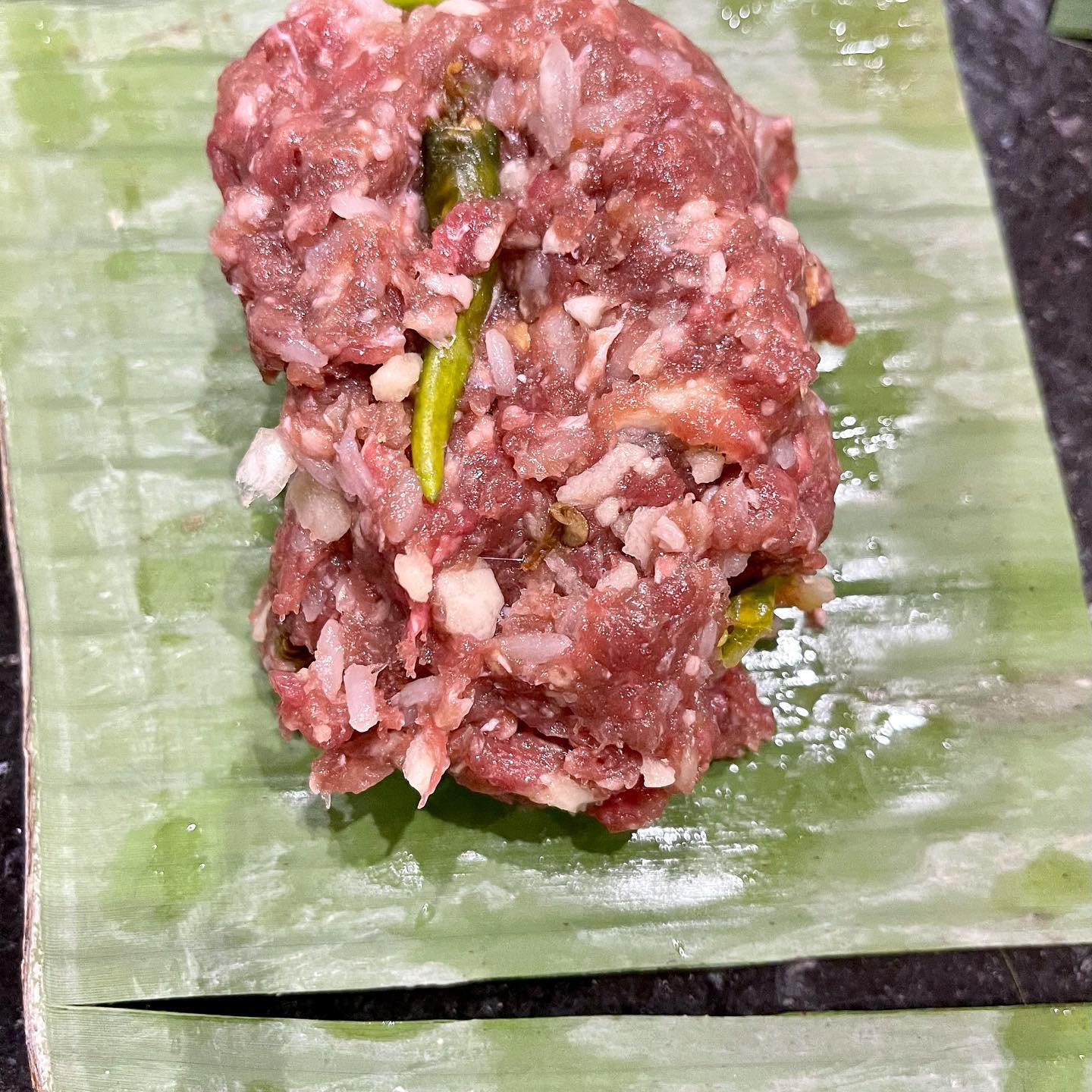 Lao Cafe - ส้มเนื้อห่อใบตอง fomented beef in banana...
