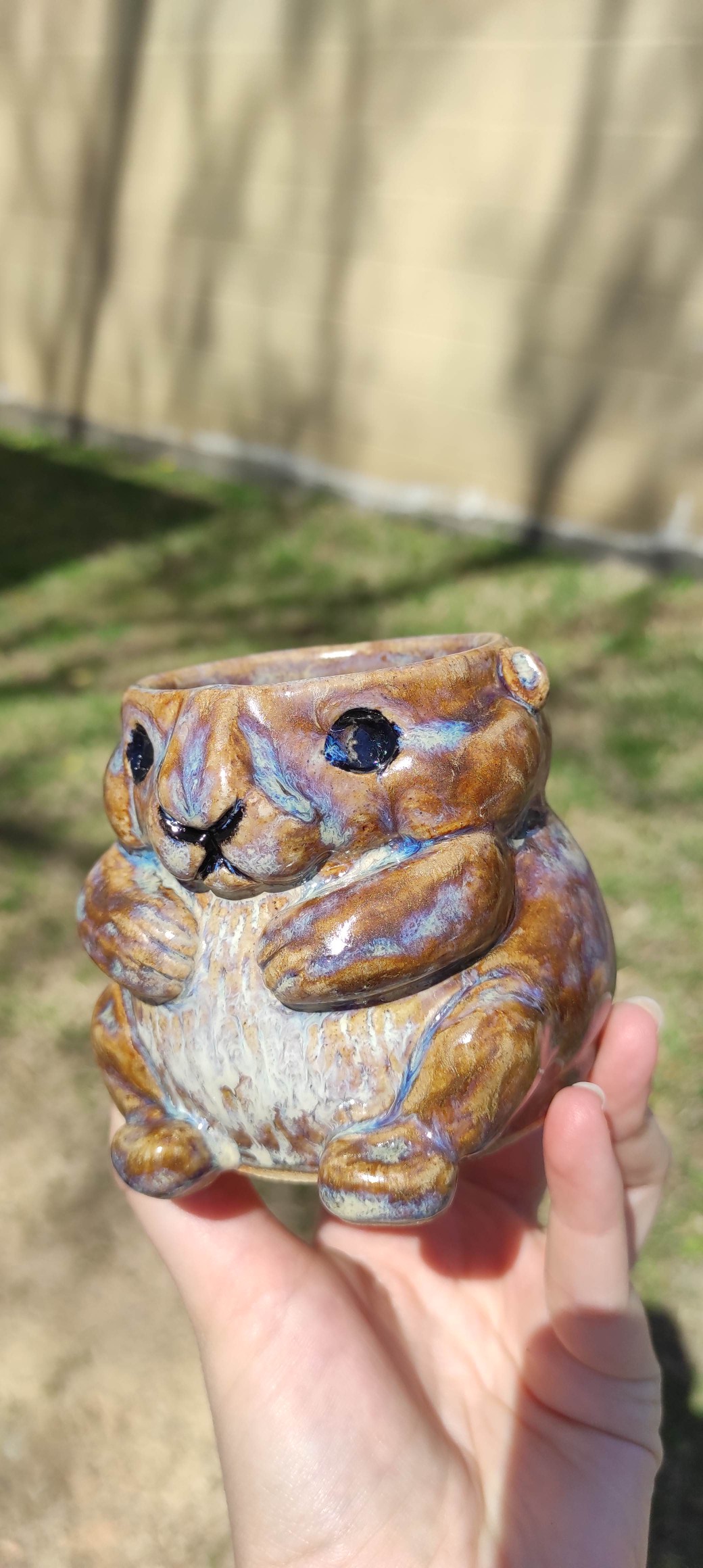 Prairie dog cup with amber quartz and macadamia glaze