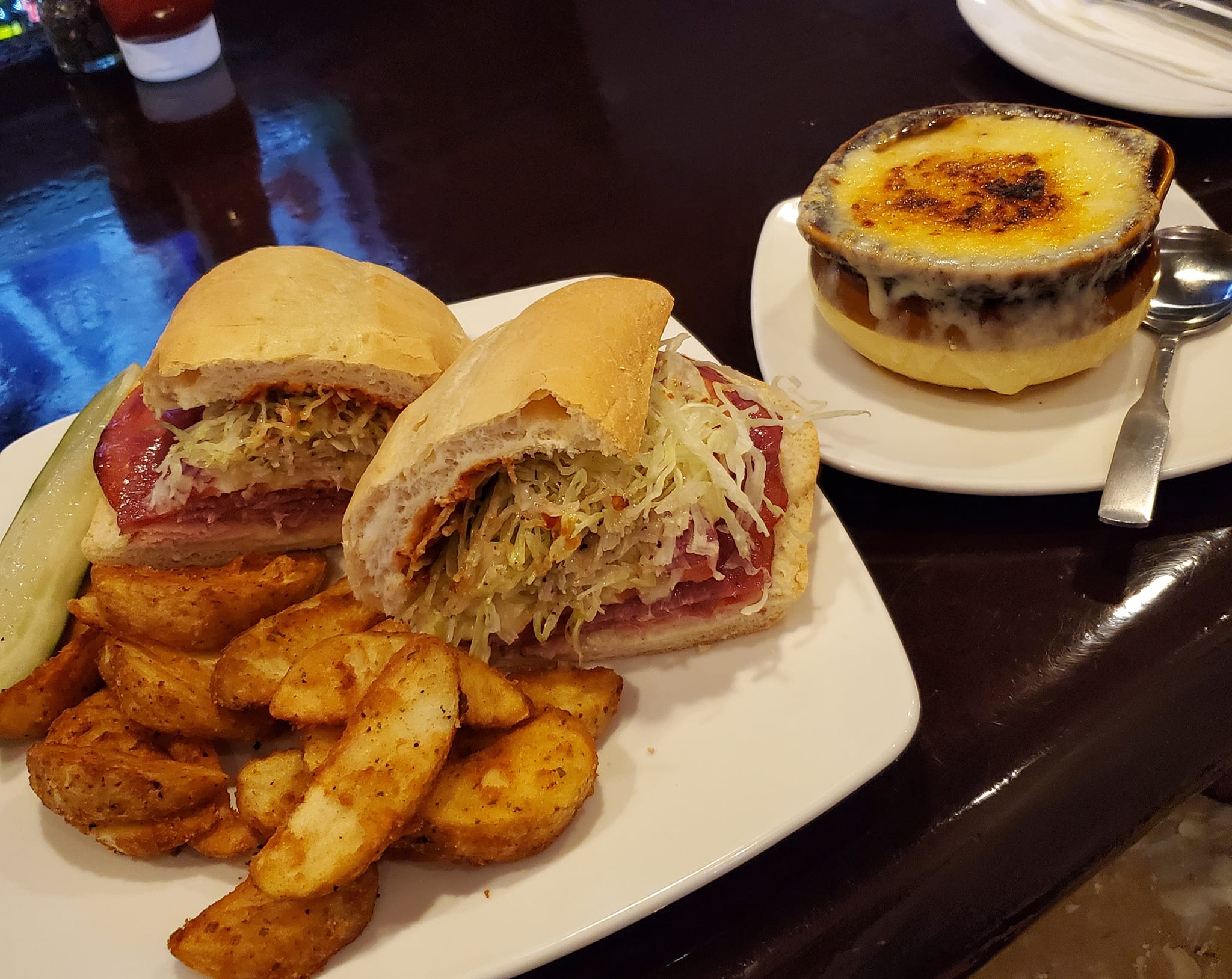 Super beef sandwich with cheese and sauces at Worcester Eats