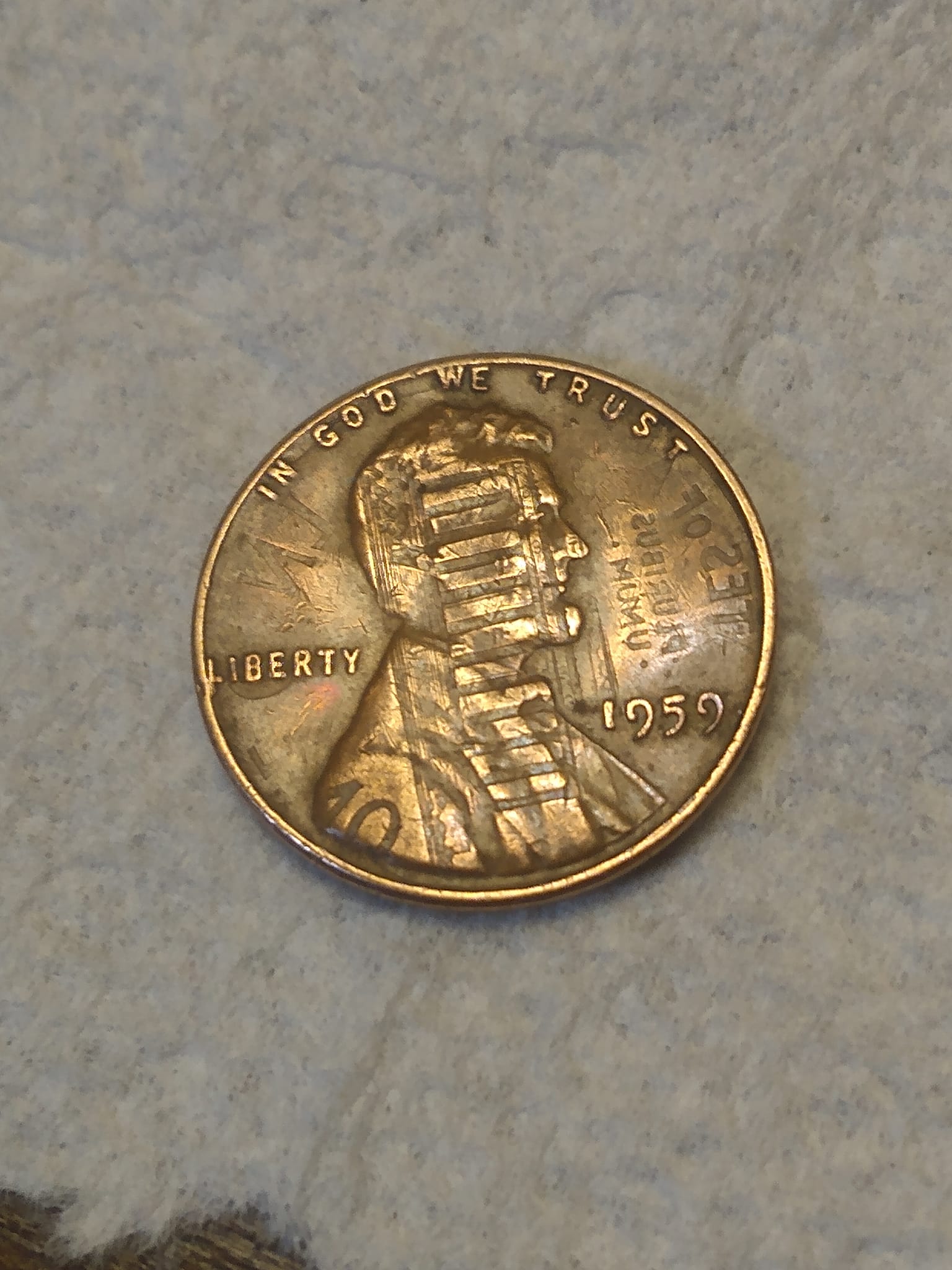 1959 no mint mark and the L in liberty is off. Please help with