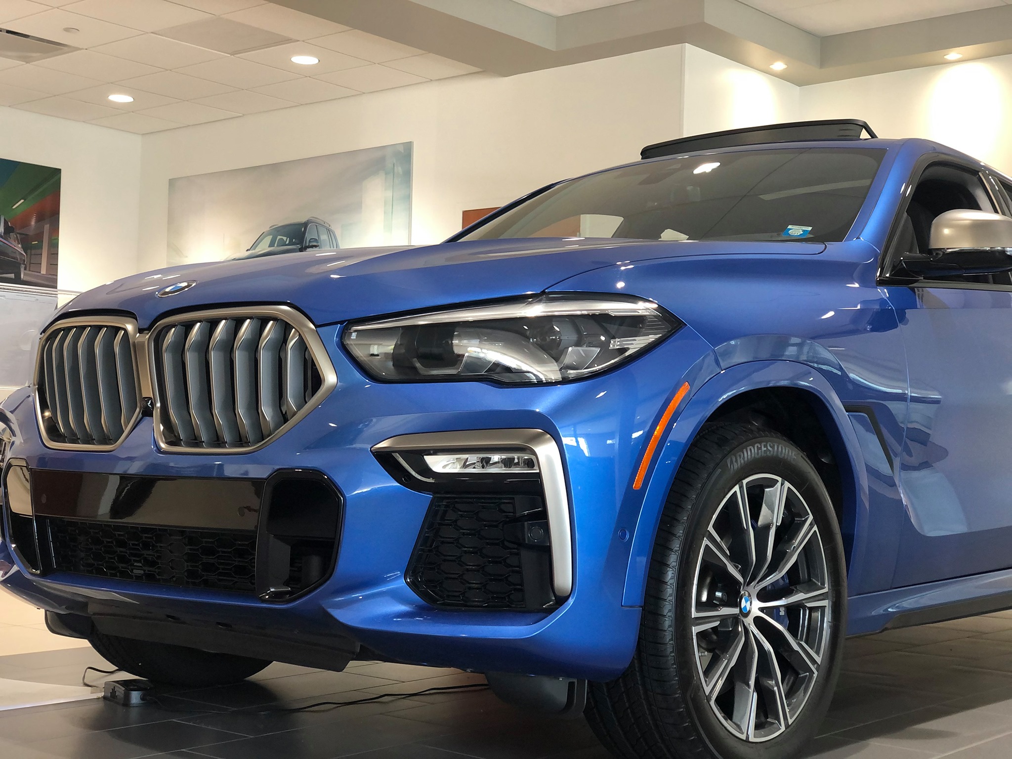 The BMW X6 M50 in Riverside Blue... - BMW of Greenwich
