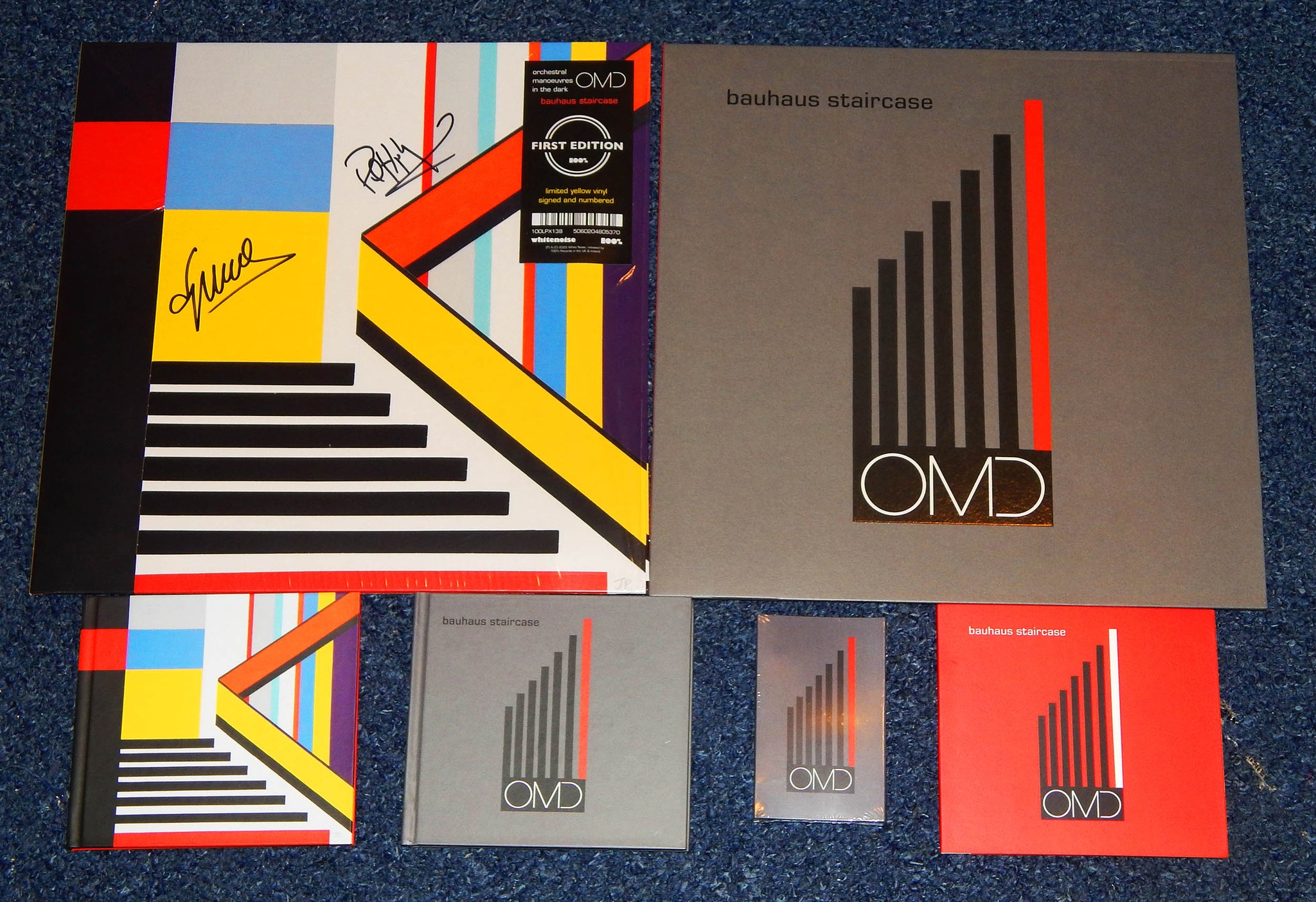 We've been at the 100% Records office signing First Edition copies