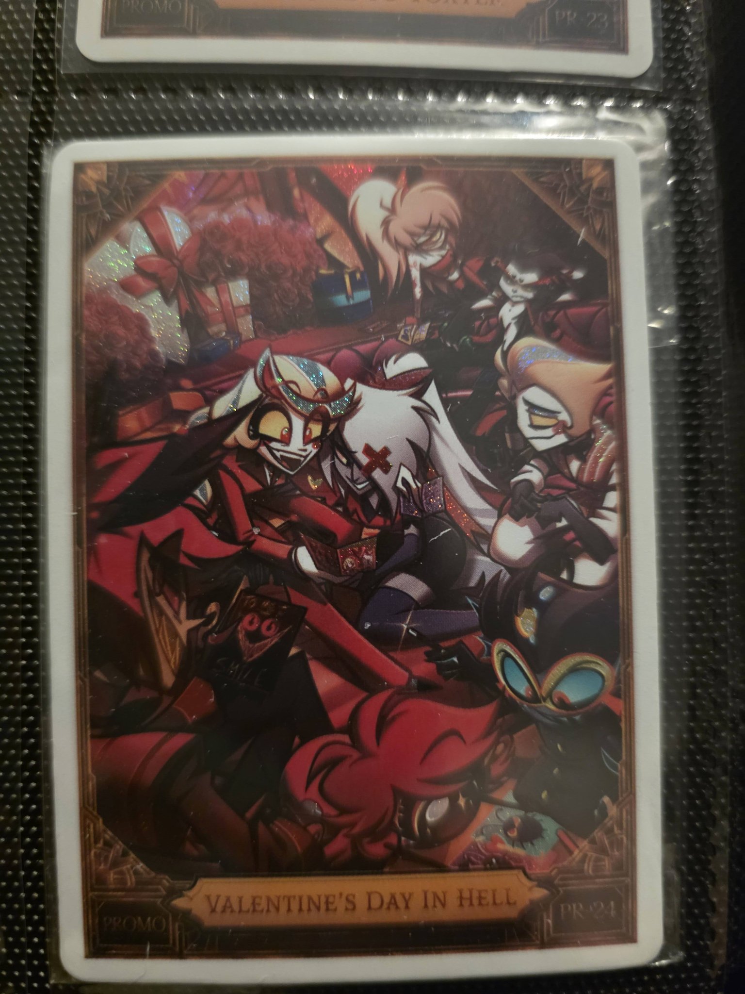 What can Valentine's Day Hazbin Hotel promo cards be traded for?