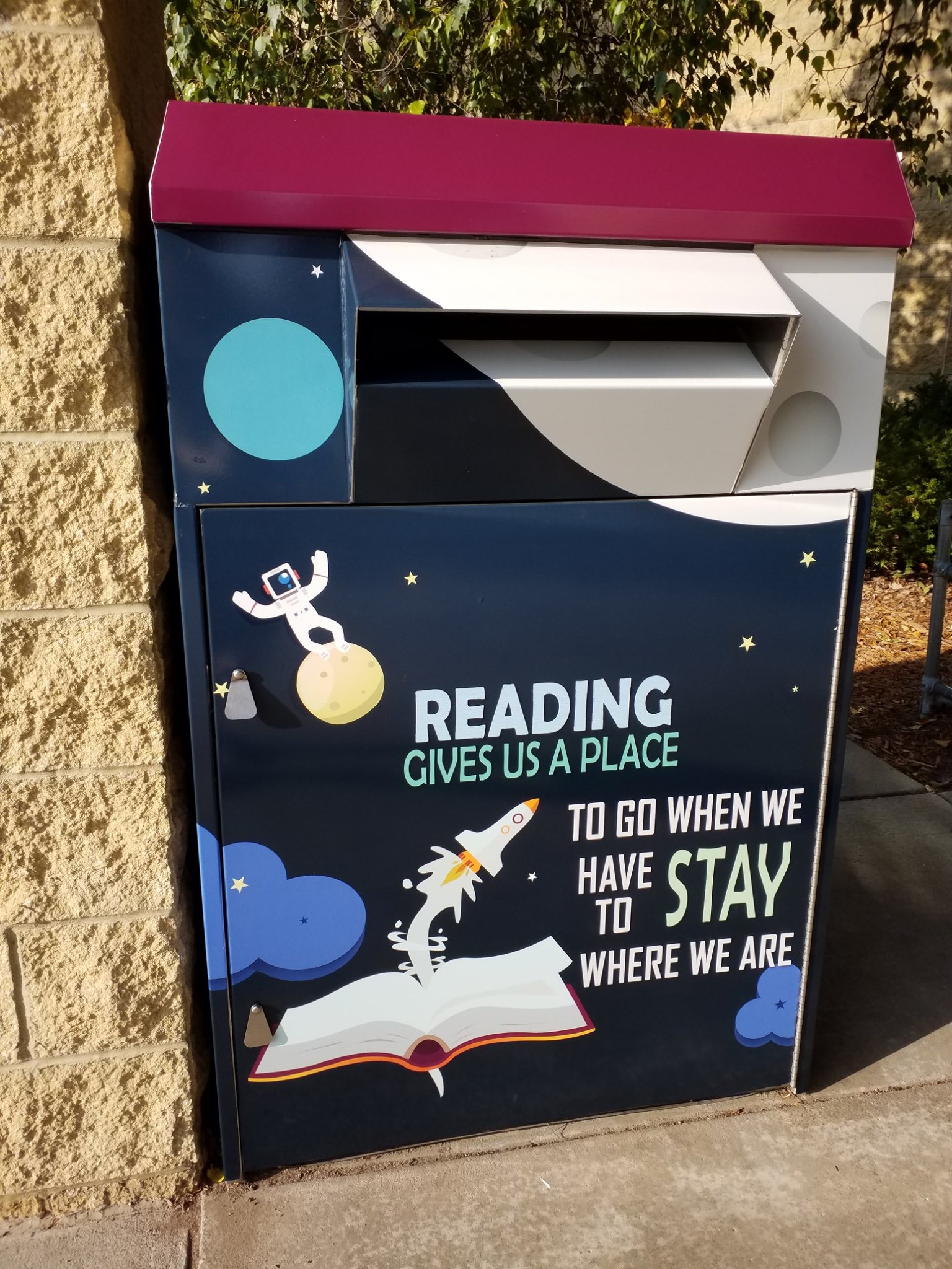 The Becker Library's outside book... - Becker Public Library