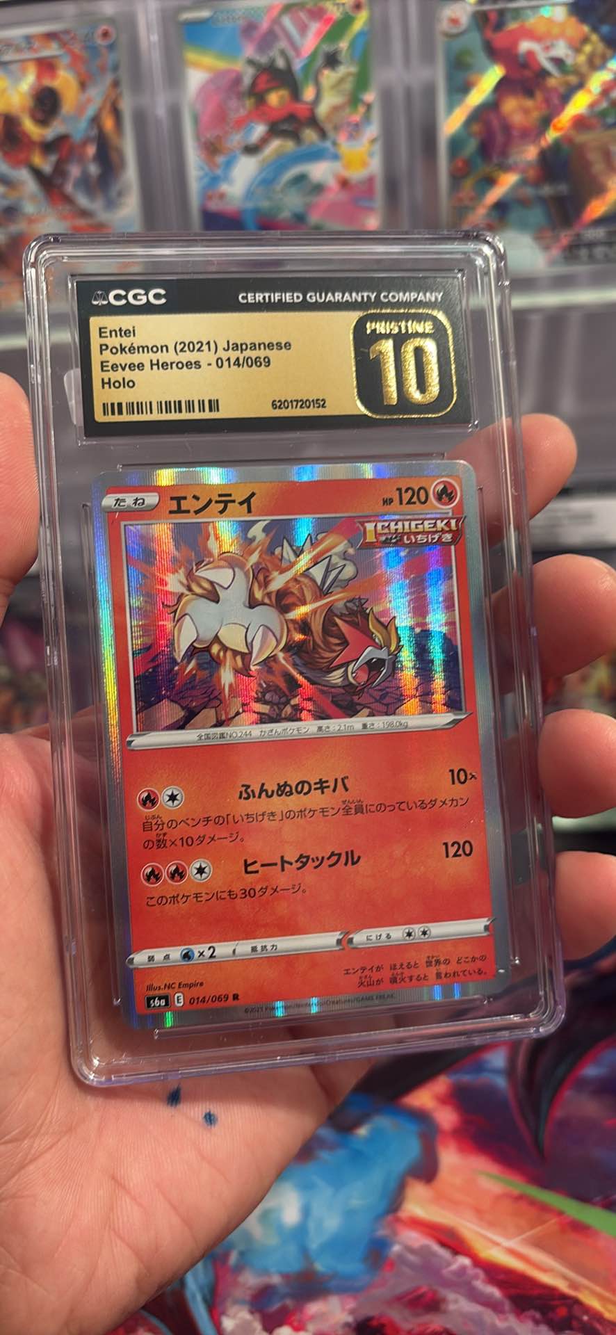 Pristine Japanese Pokémon trading card is a holo Entei from the