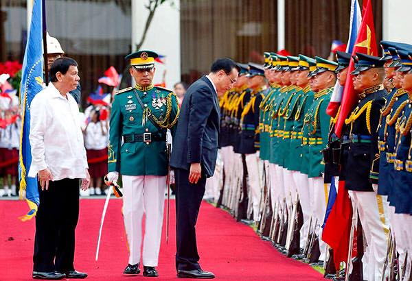 Philippines Nationalism - Philippines, China sign 14 deals during ...