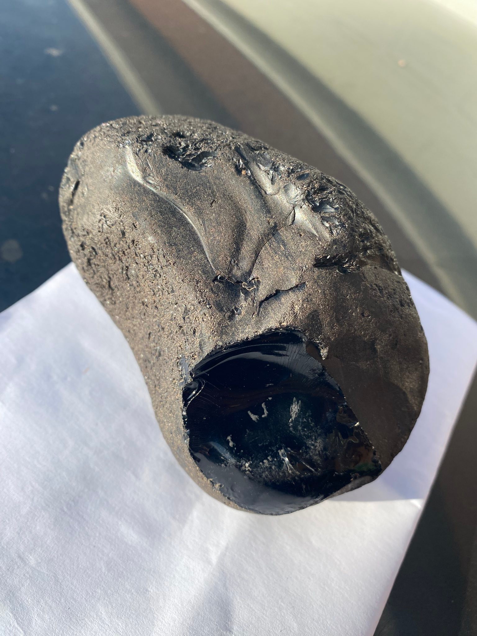 Is this black rock obsidian or glass?