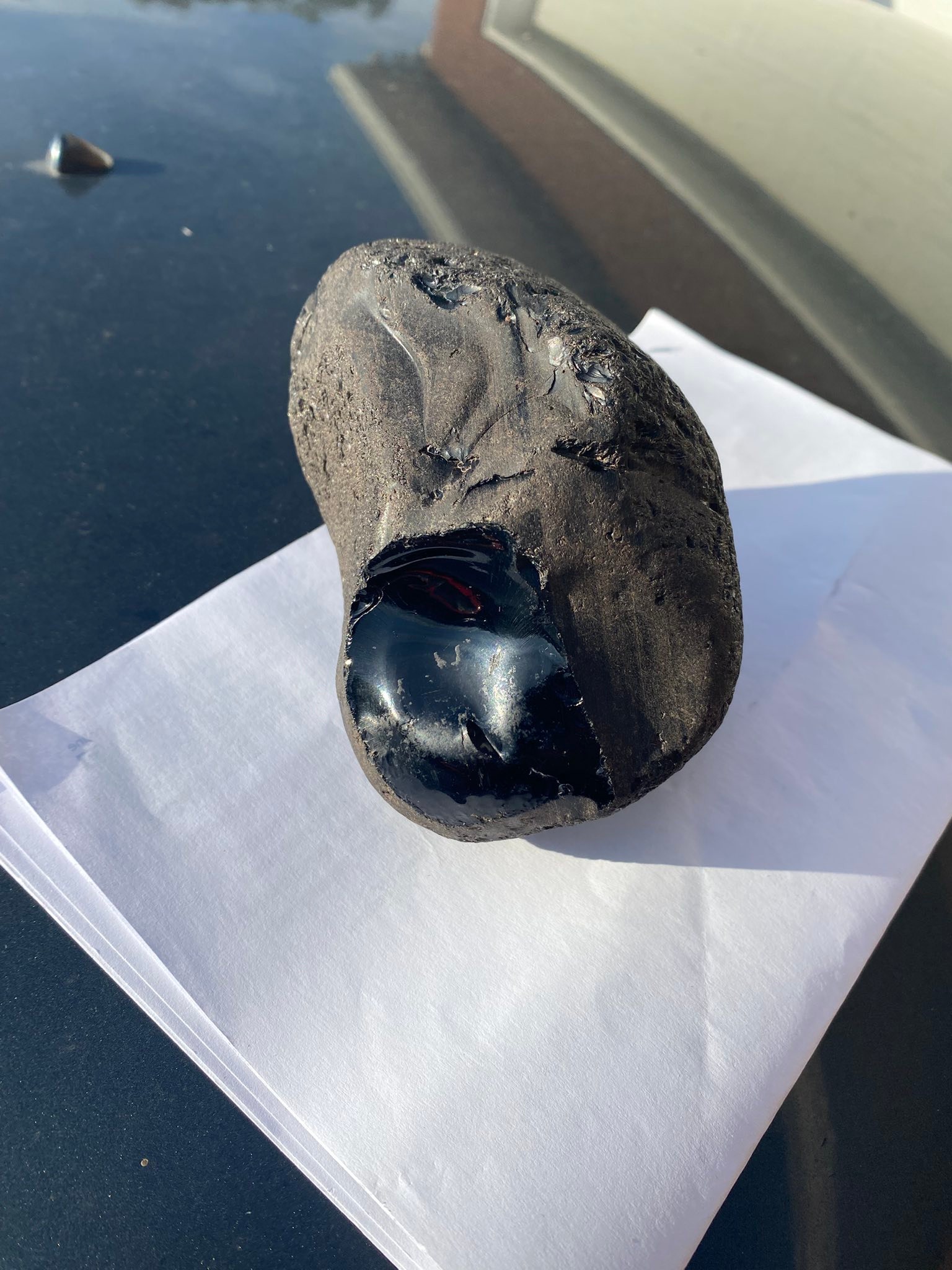 Is this black rock obsidian or glass?