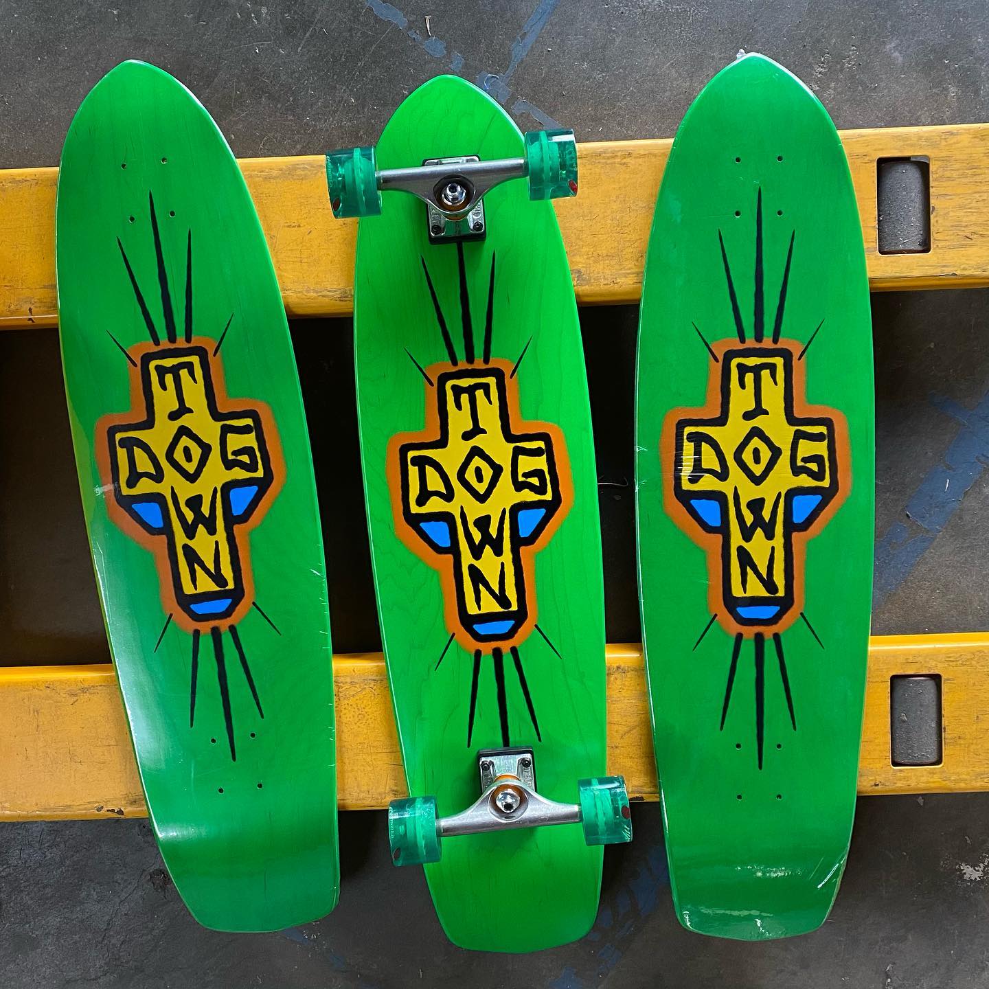 Dogtown Skateboards fluorescent green longboard decks and completes