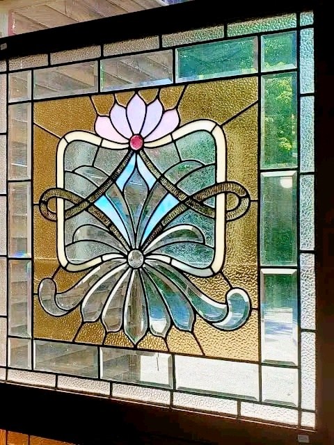 Stained glass clear panel with beveled inserts for window