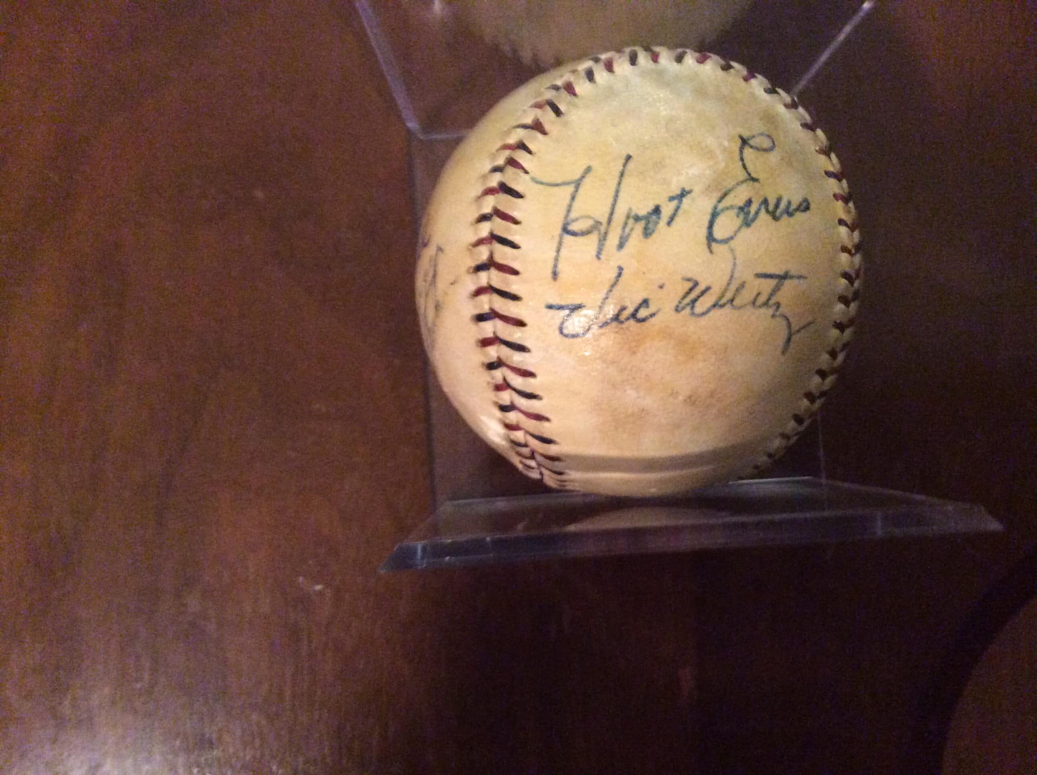 TBT A member of the Detroit Tigers Baseball Team autographs a ball