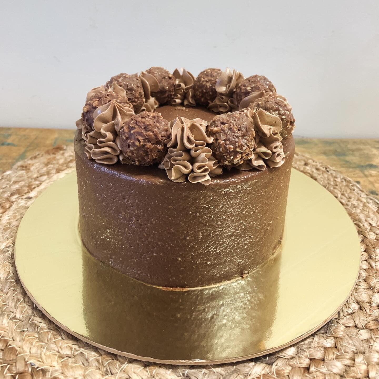 Baked - Ferrero Rocher Cake This cake is a Ferrero rocher lover’s dream ...