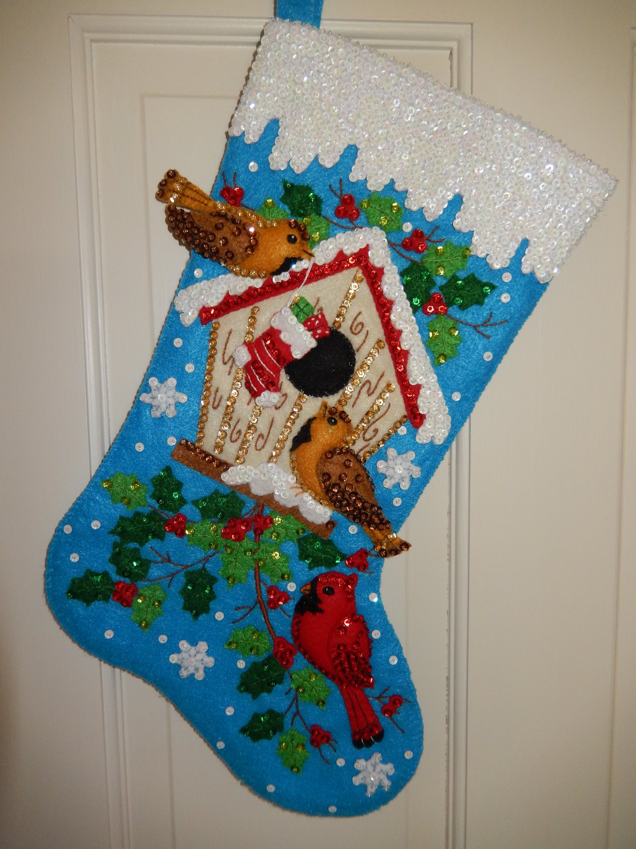 Cockatiel on Santa's head in handmade Bucilla stocking
