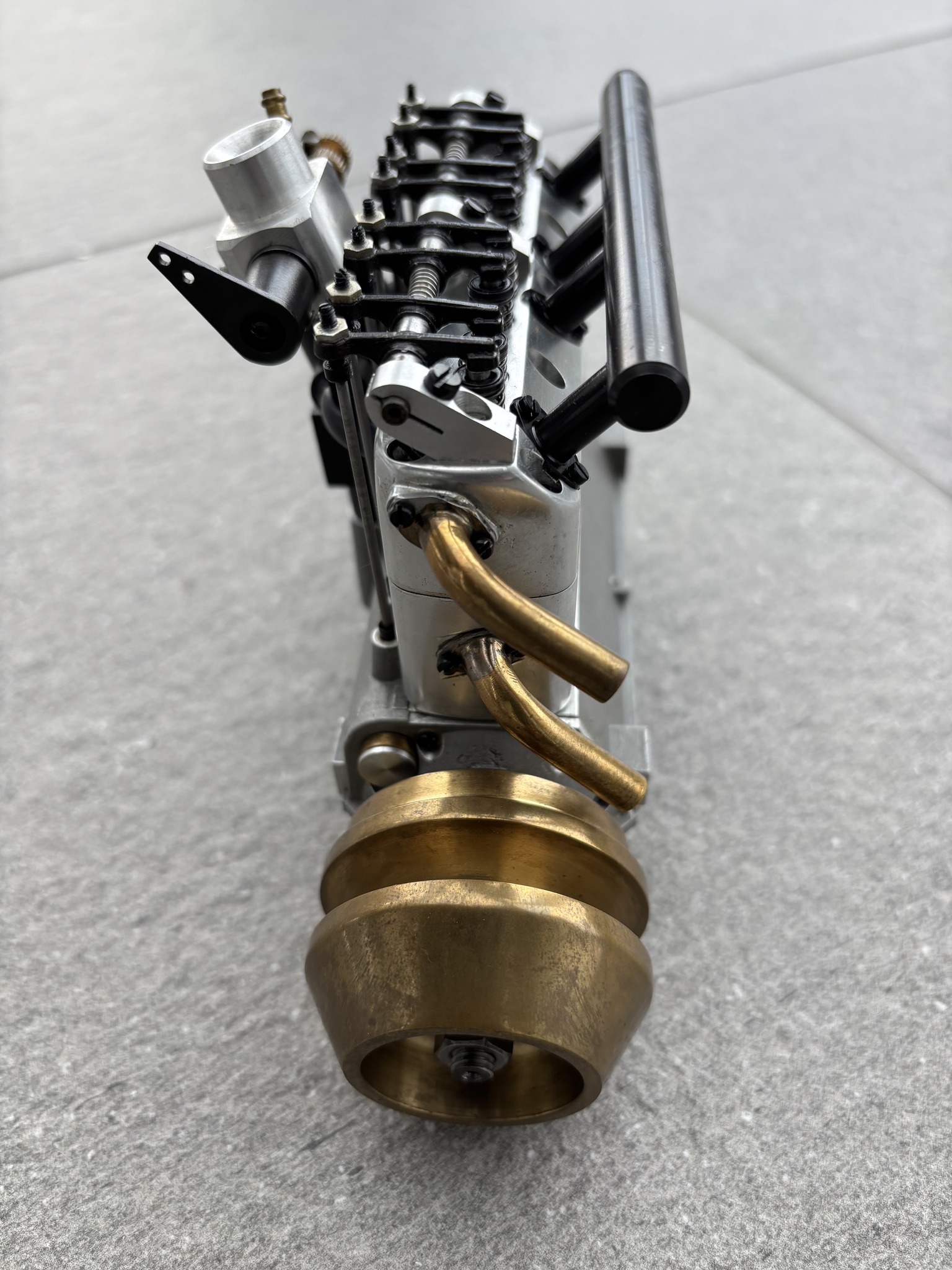 The 221 SP engine is an inline six-cylinder, four-stroke