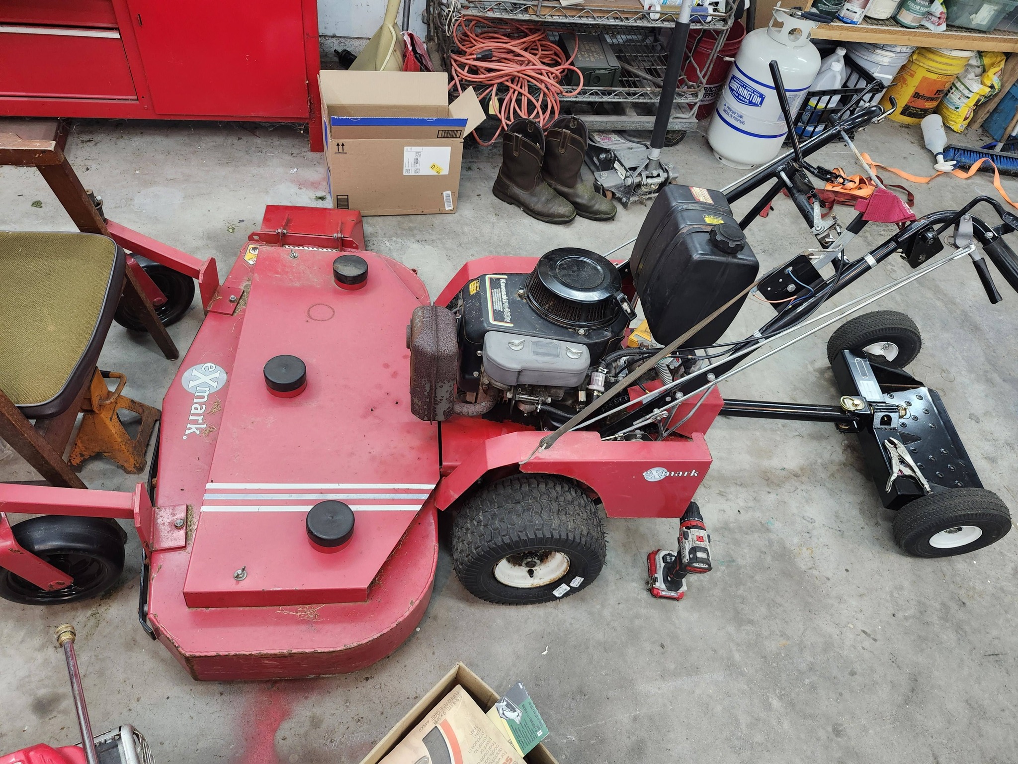 Exmark zero-turn mower issues: belt adjustment, reverse detent
