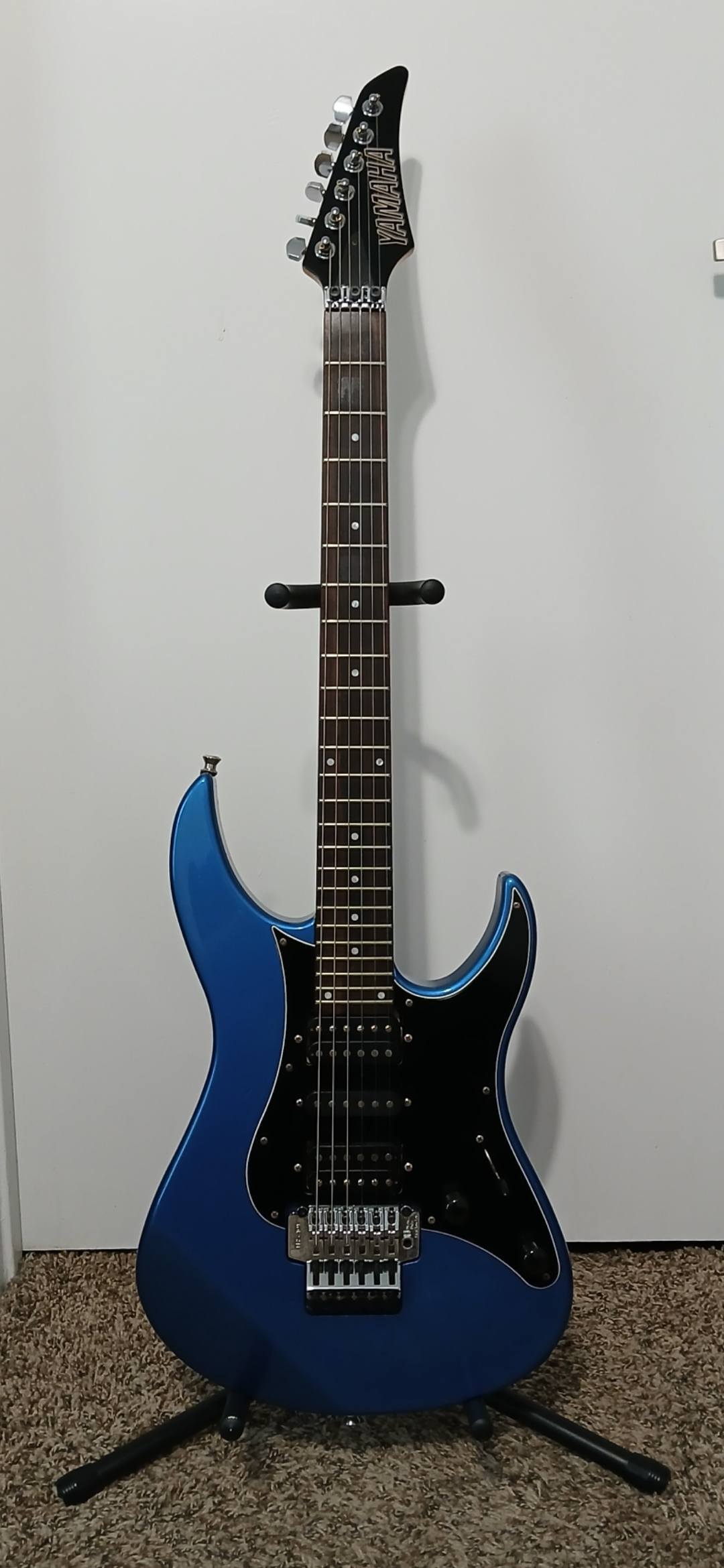 What are the differences between Yamaha RGZ321P and upper-end models?