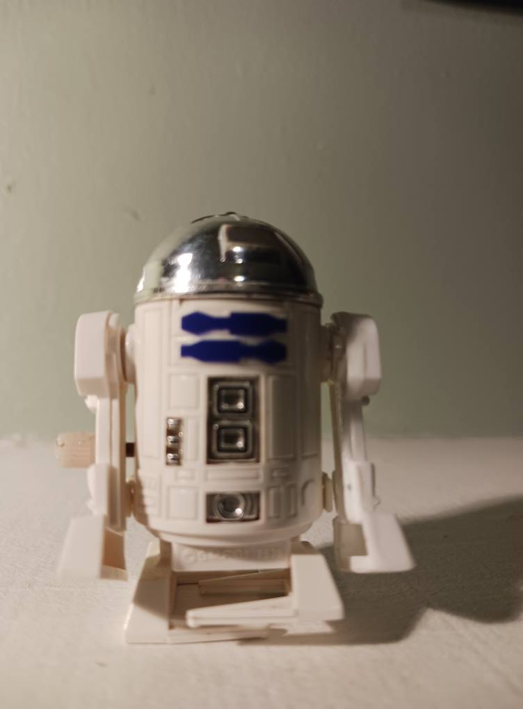 Does the Takara wind-up R2-D2 fit with the original Star Wars line?