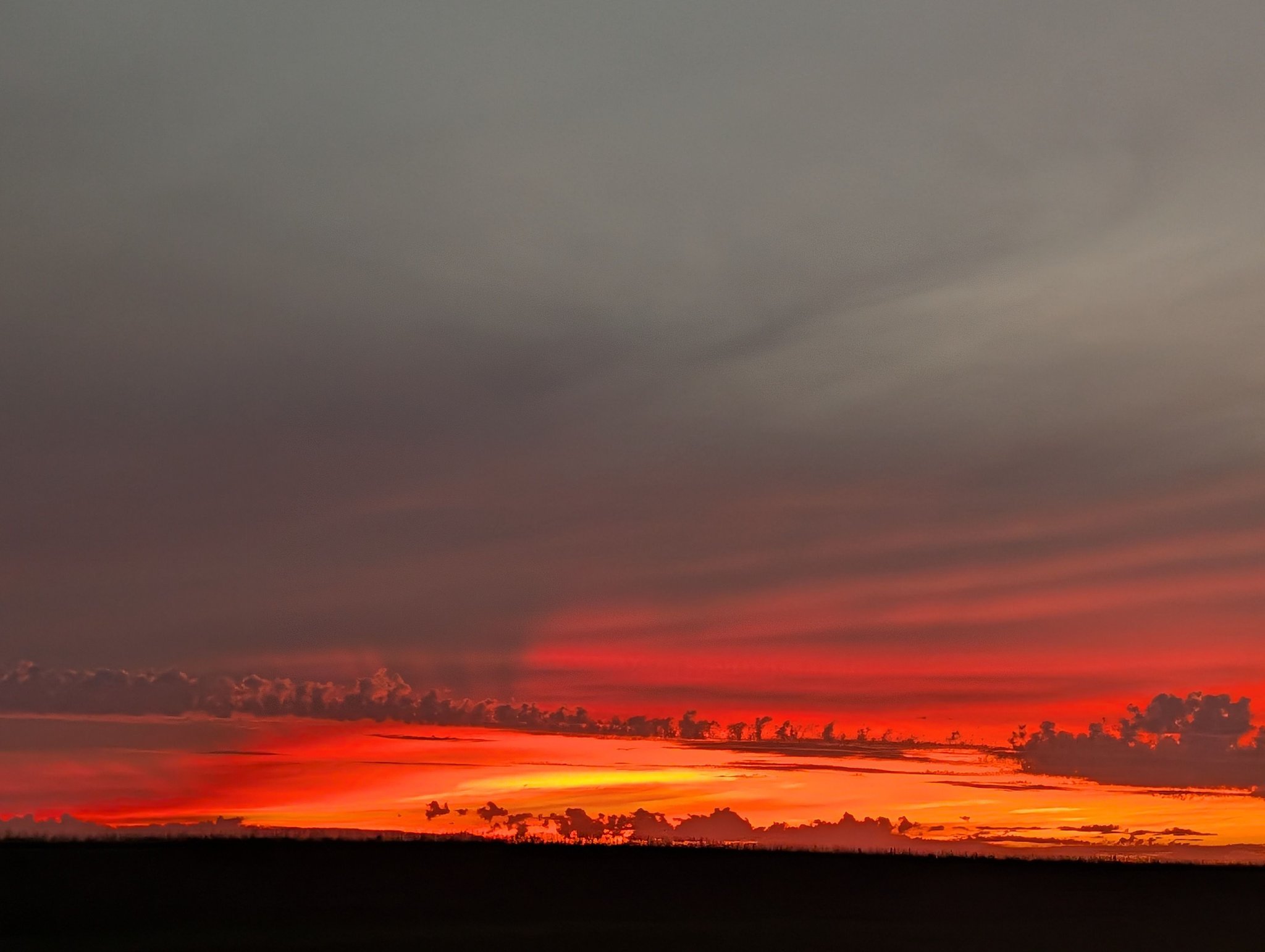 Breathtaking western Minnesota sunset from a moving car