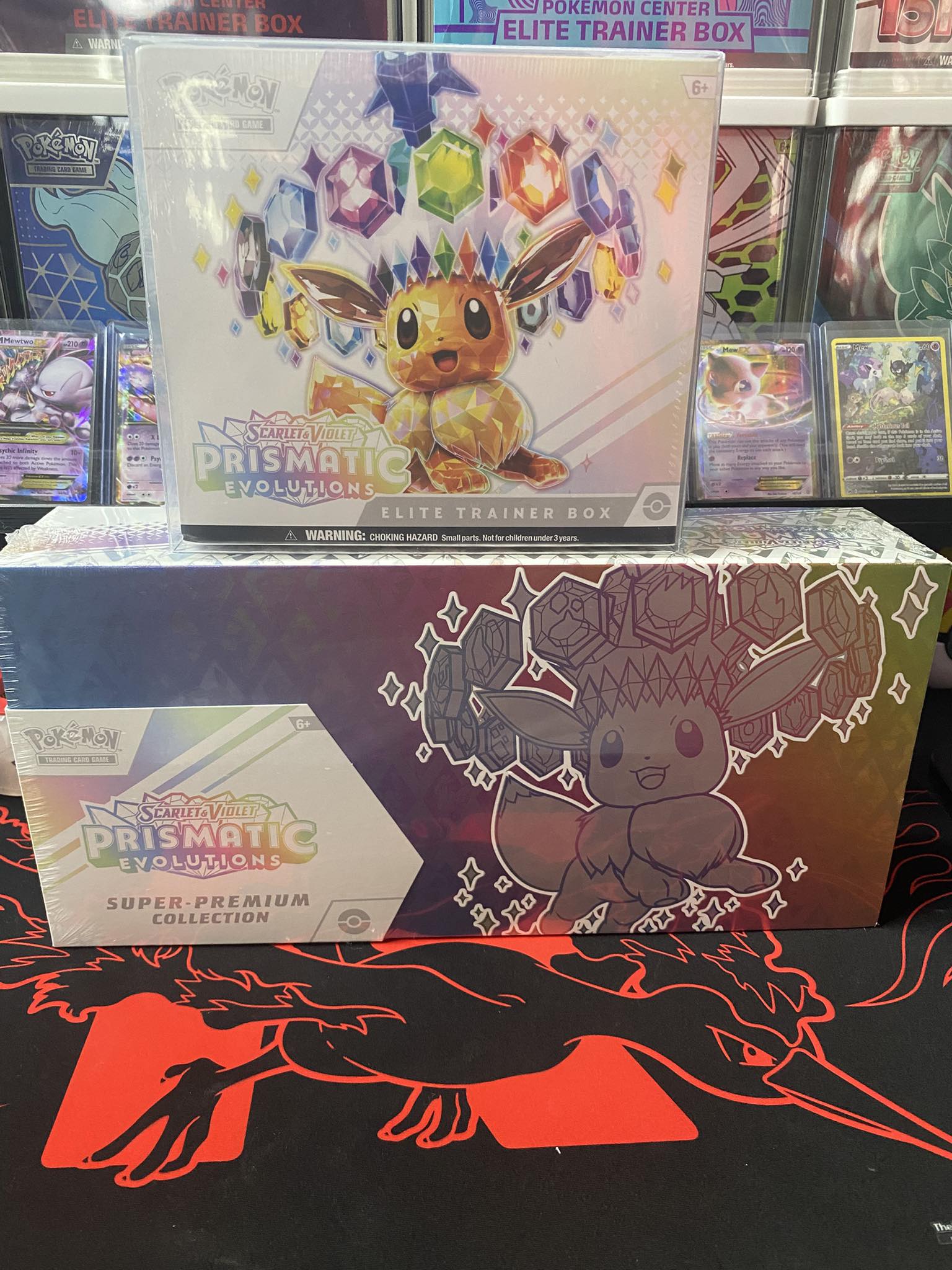 Looking to trade these and $50 for a prismatic evolutions Pokémon 