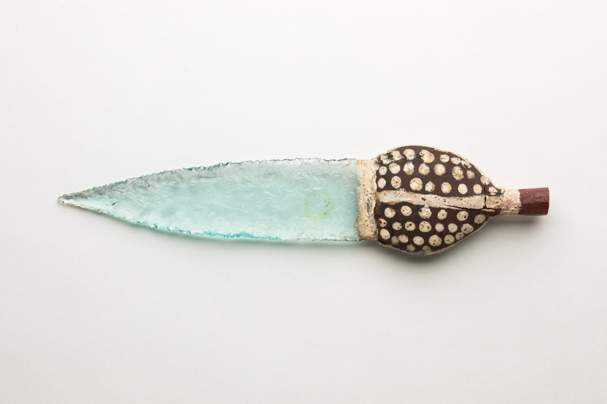 National - This exquisite object is a glass spearhead. It was likely ...