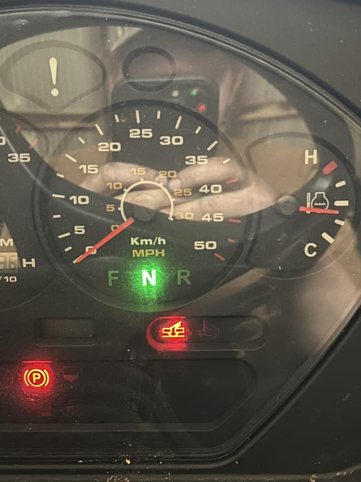 What does the warning light symbol mean on a 5835R tractor?