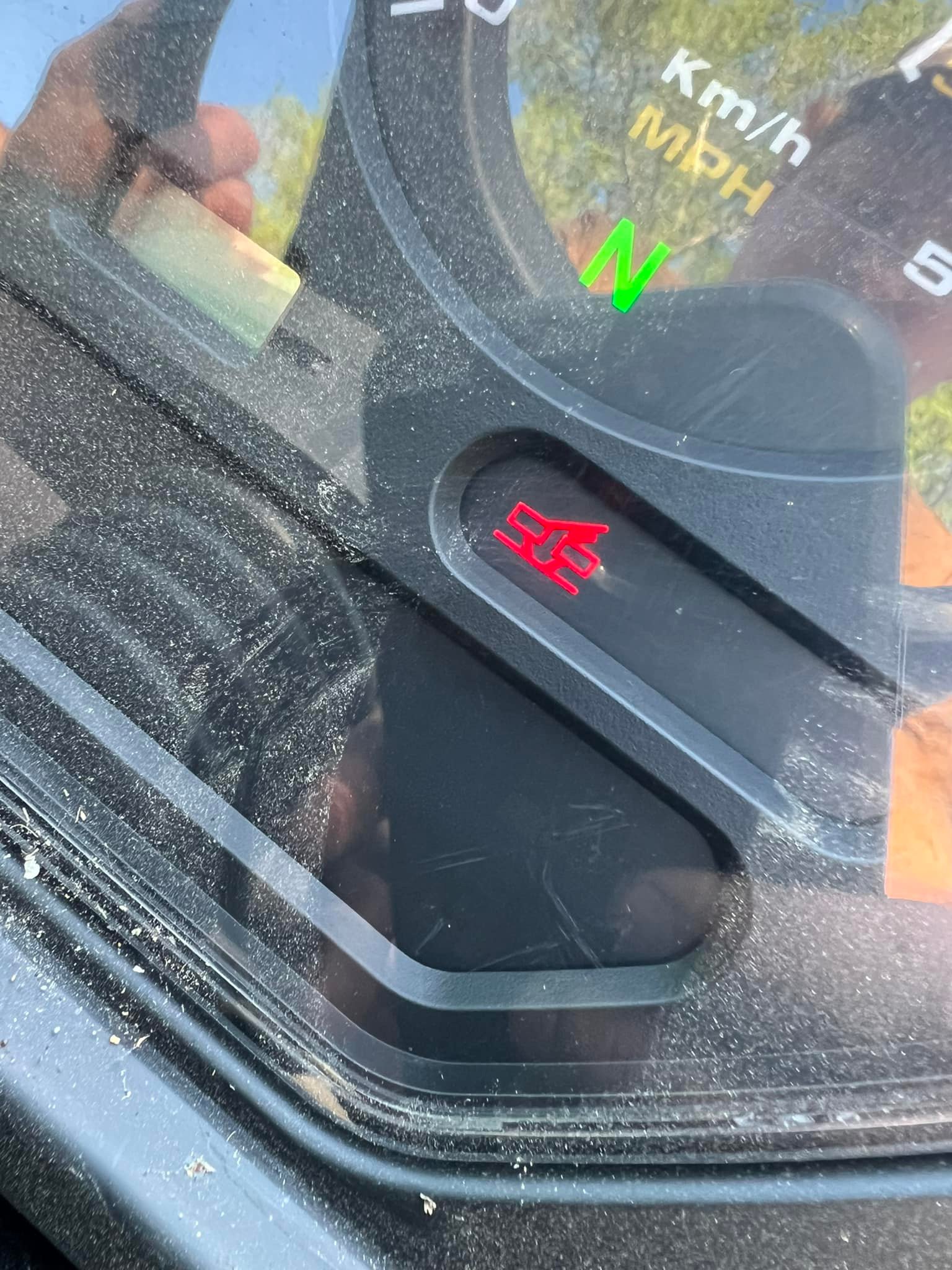 What does the warning light symbol mean on a 5835R tractor?