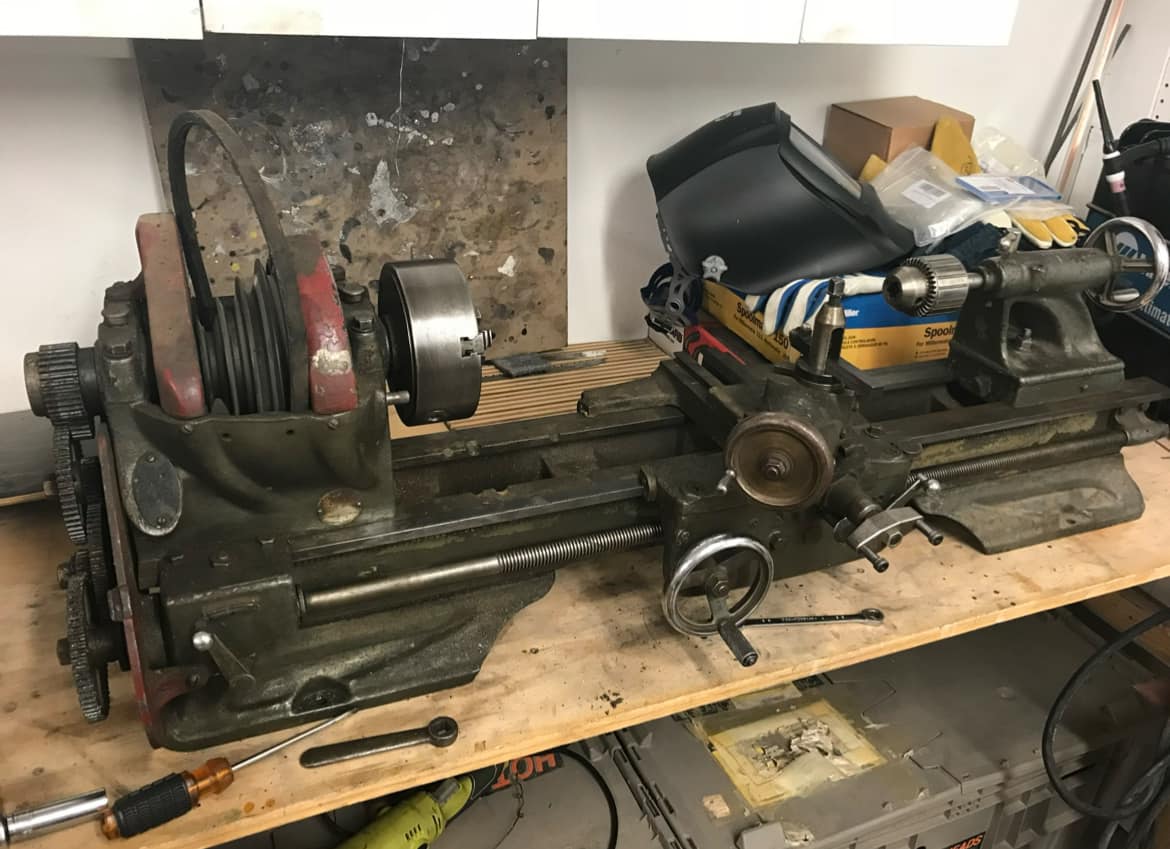 What is the vintage and model number of the Atlas lathe?