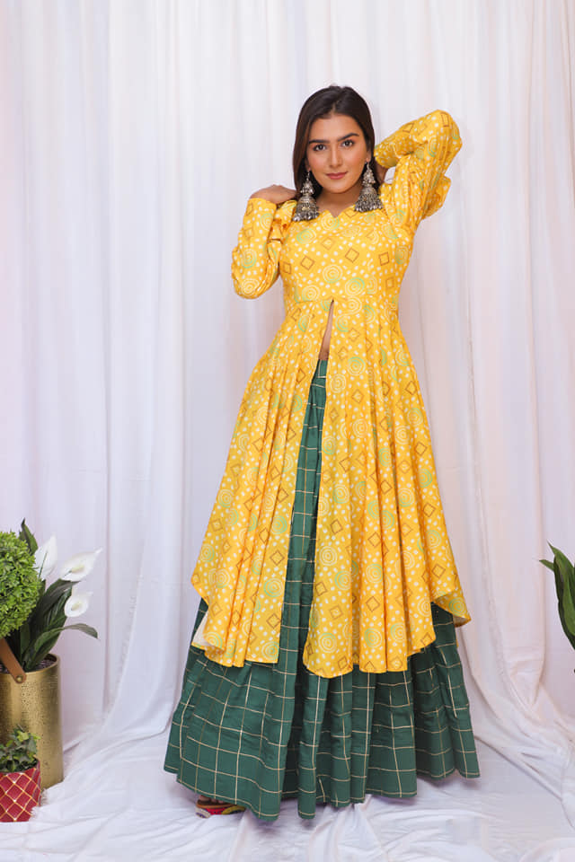 green indo western dress for mehndi function A beautiful indo-western outfit with ballooned sleeves and a flared bottle chaniya can be a great choice a Haldi or Mehendi function!💚💛 DM us to get your customized with us Sheer Neck