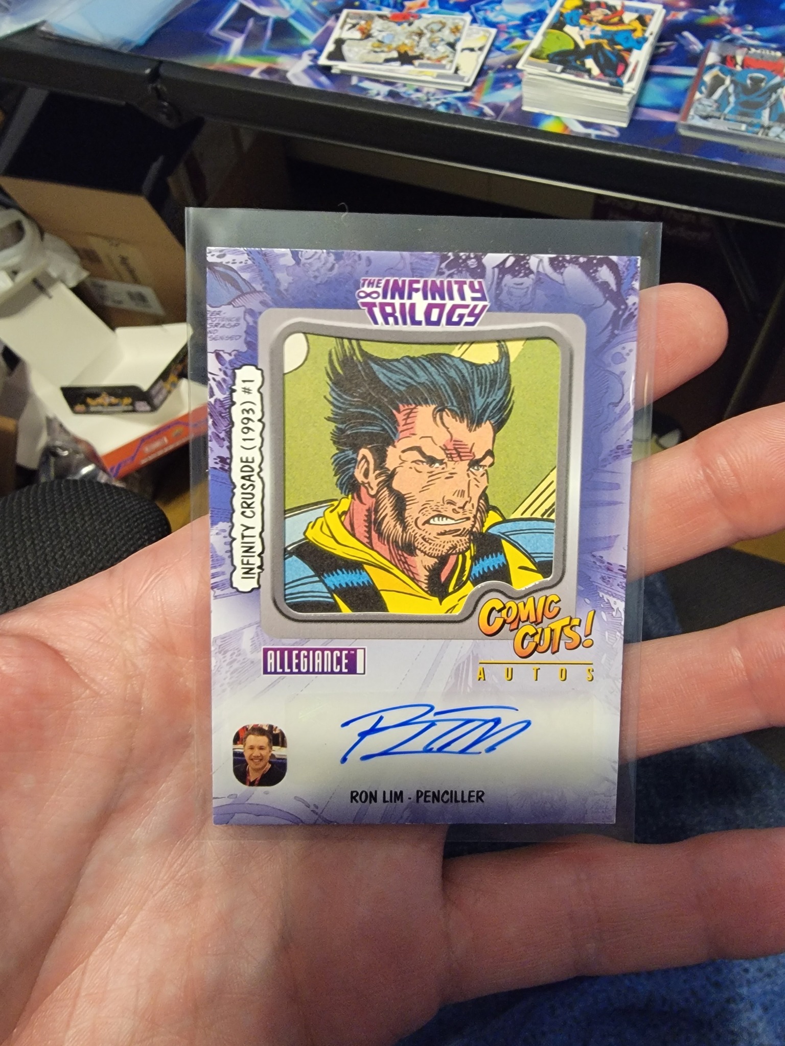 What is the comic book panel art card featuring Ron Lim