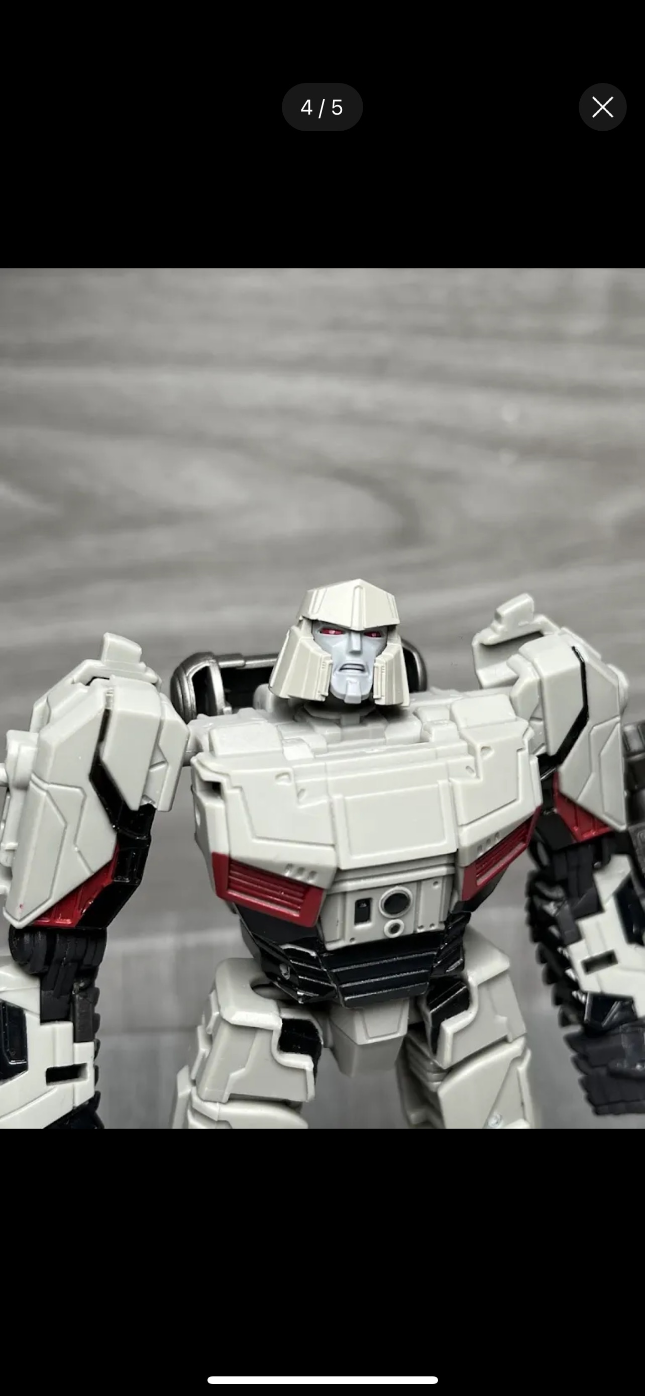 Round head Gen1 Optimus and the “grrr” megs tf one head upgrade