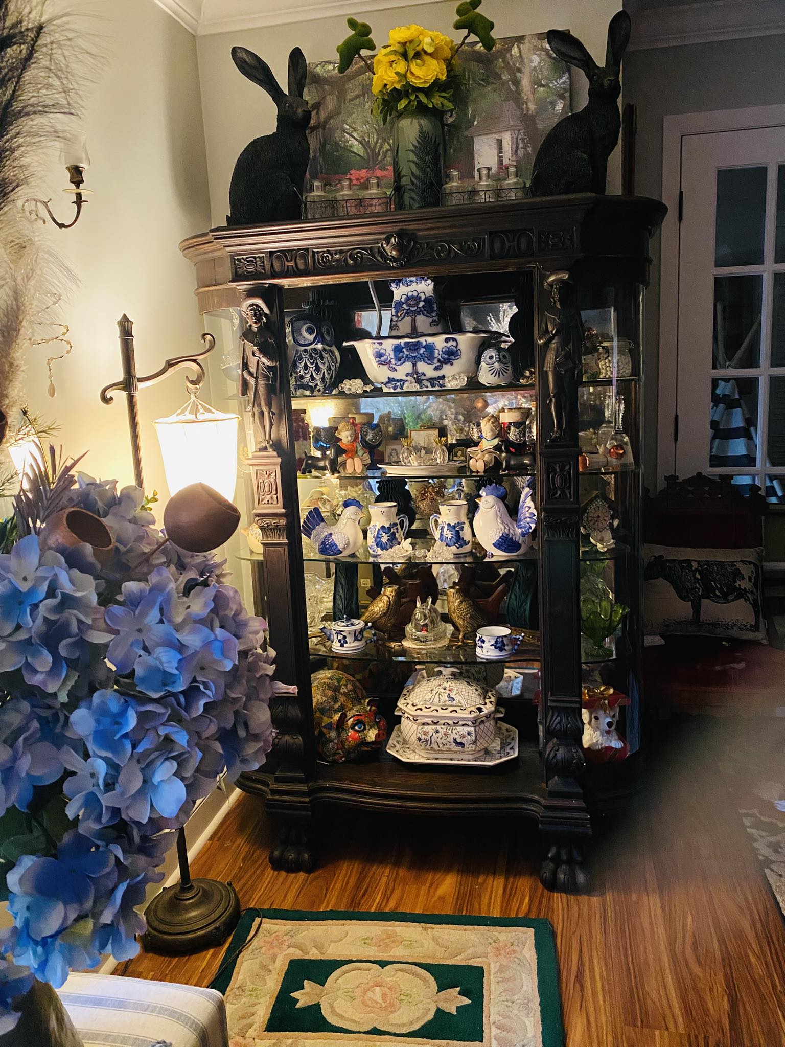 Vintage 1800s china cabinet in a primitive home