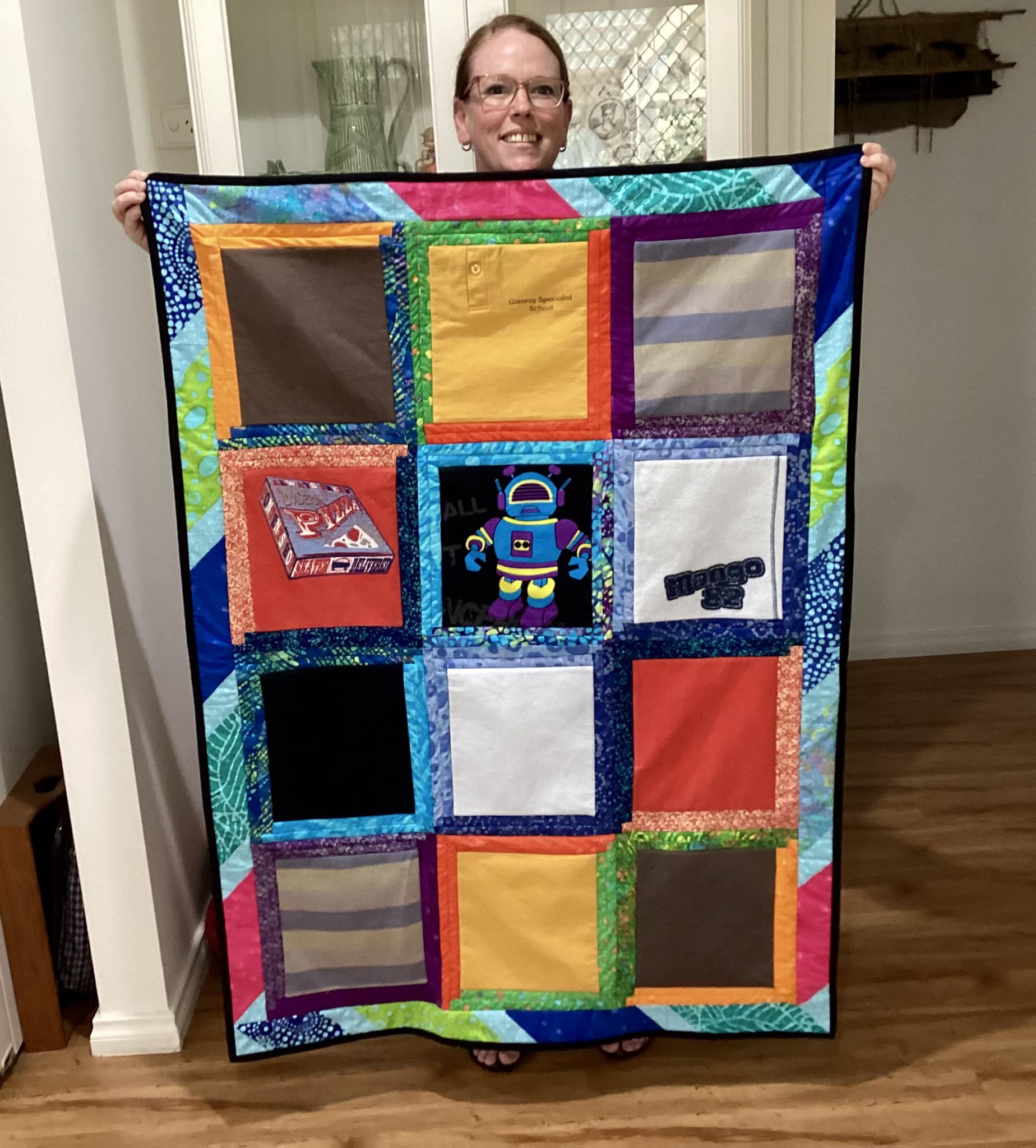 Memory quilt made from UPS shirts for a grieving mother