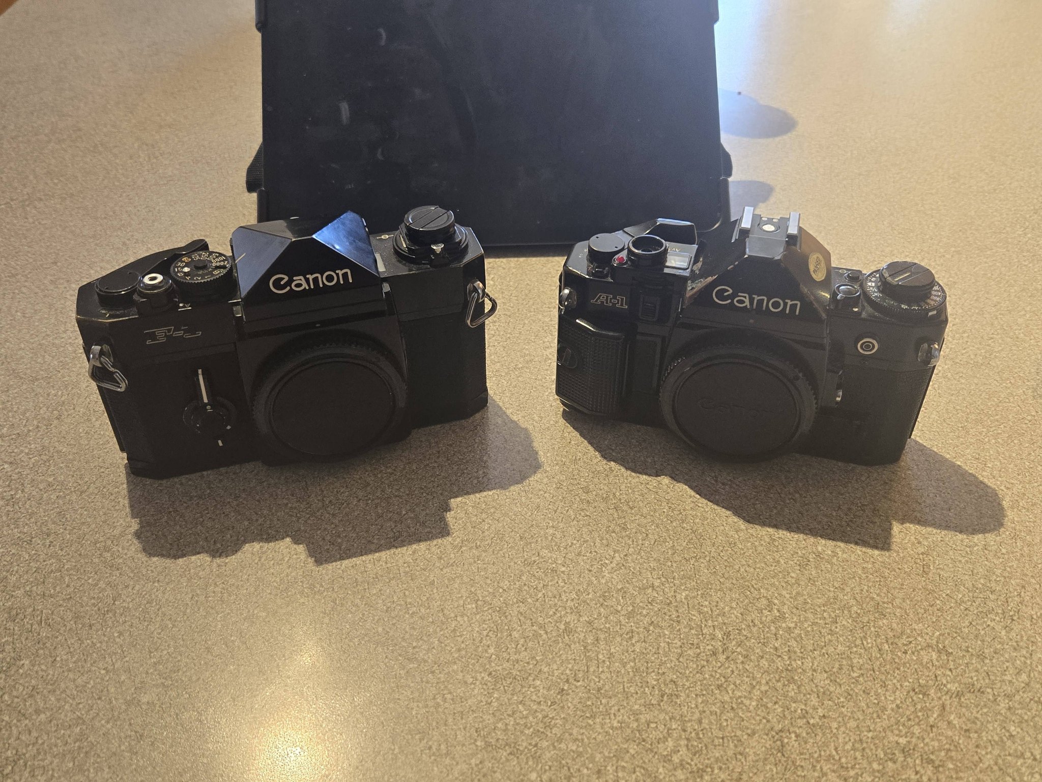 Canon AE-1 with FD 100-300mm lens and 400TX