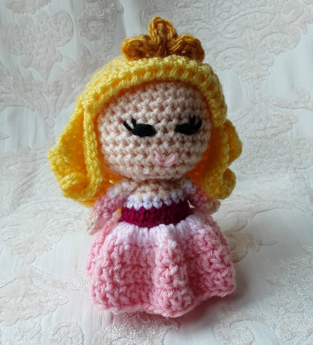 Todays princess is Aurora, more commonly known as Sleeping Beauty. Here she is in the pink version of her colour changing dress. Any guesses for tomorrow's princess?? www.woolyoubemine.com #crochet #crochetersofinstagram #crochetaddict #crochetlove #