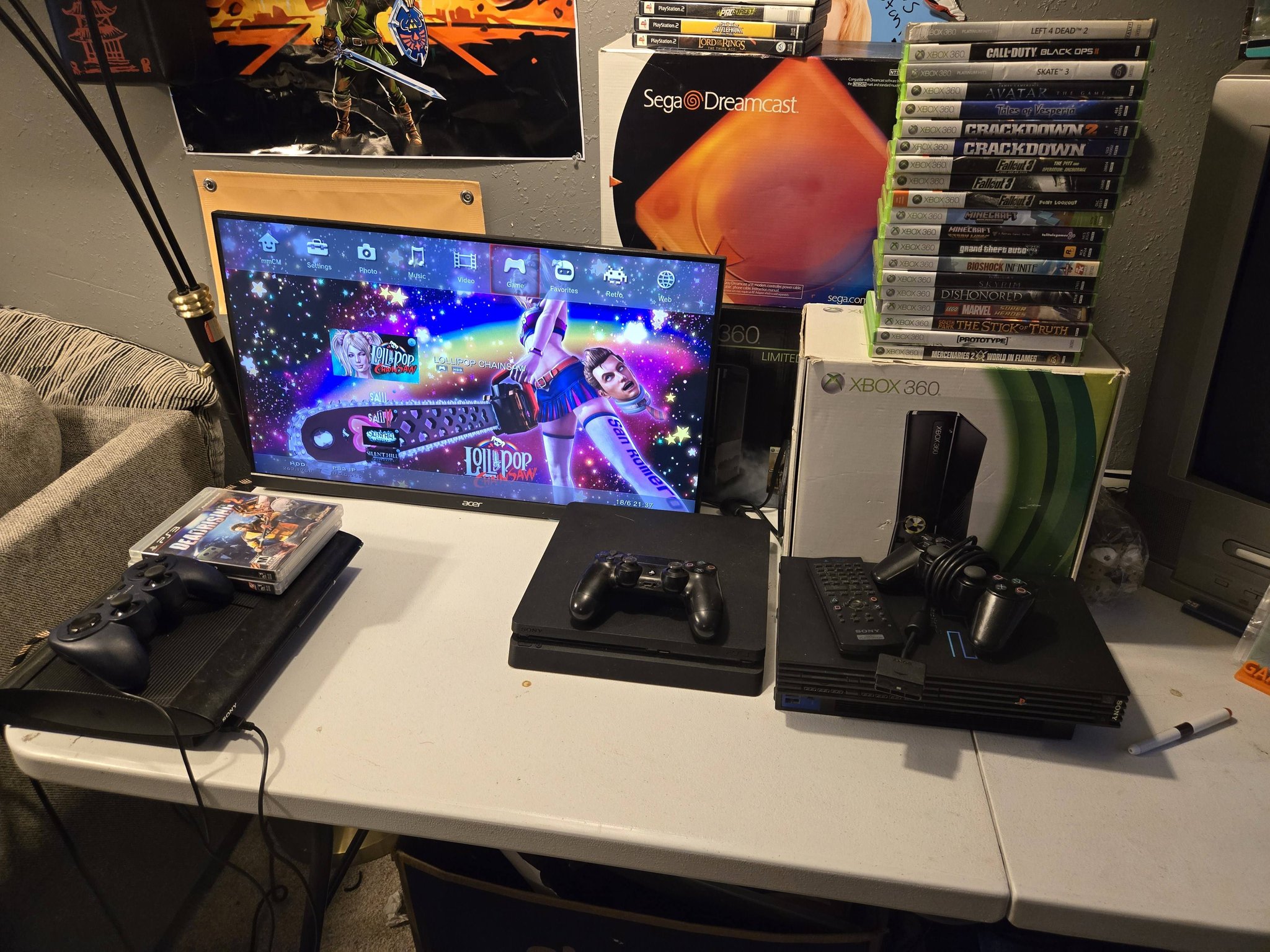 Video game consoles and games for sale including PS2, PS3, PS4