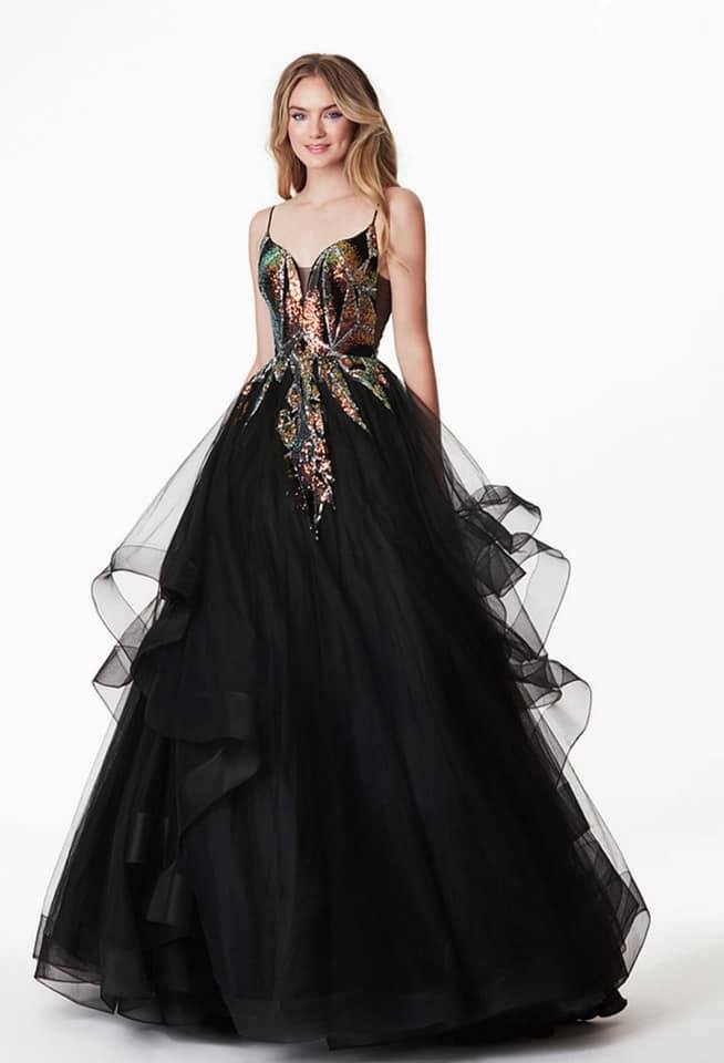NEW ARRIVAL This daring black... - Mina's Bridal & Prom