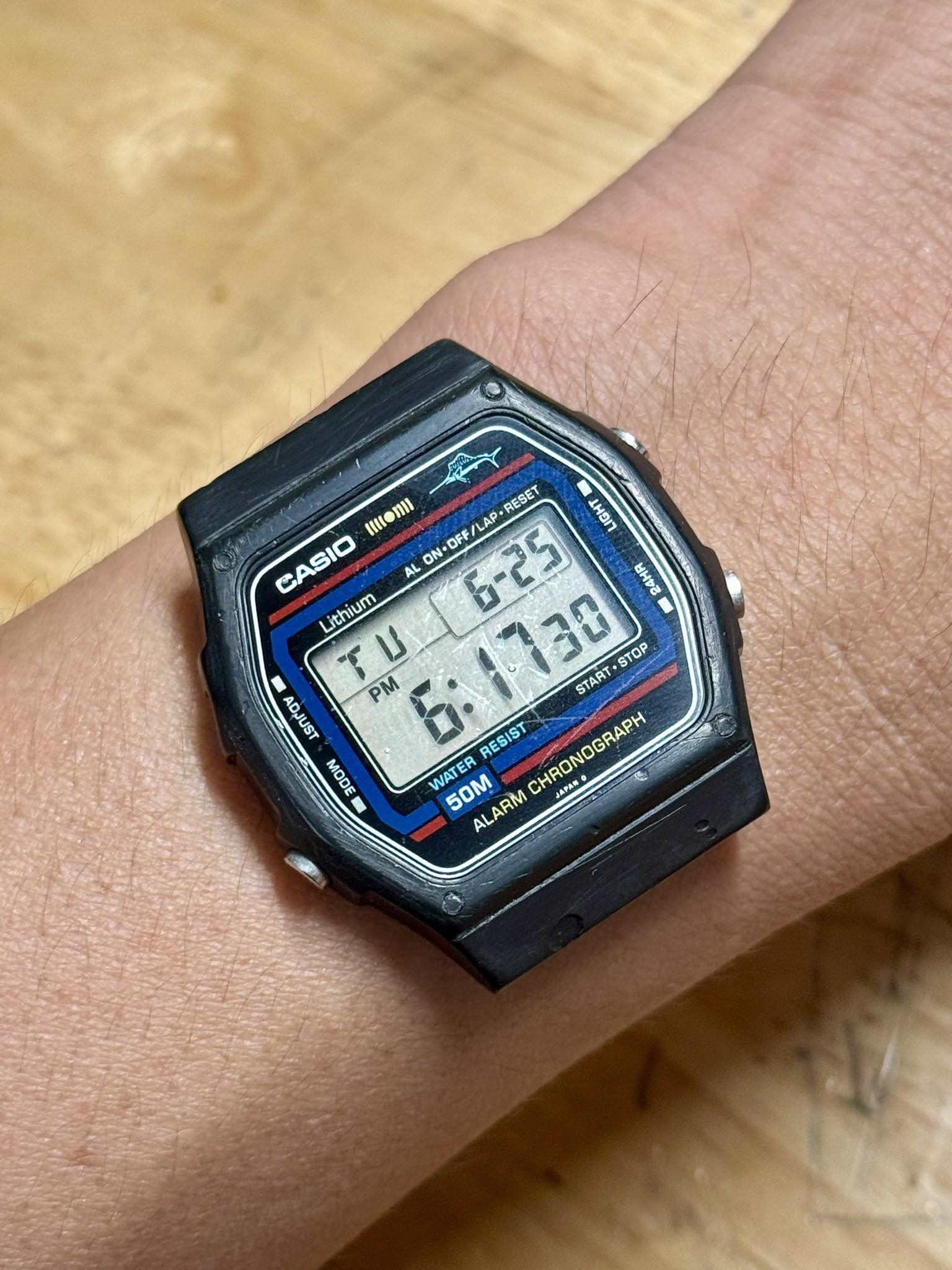 Casio W24 Marlin 令 RESET iom CIGH CASIO ON- OFF/ b-25 LAP AL 