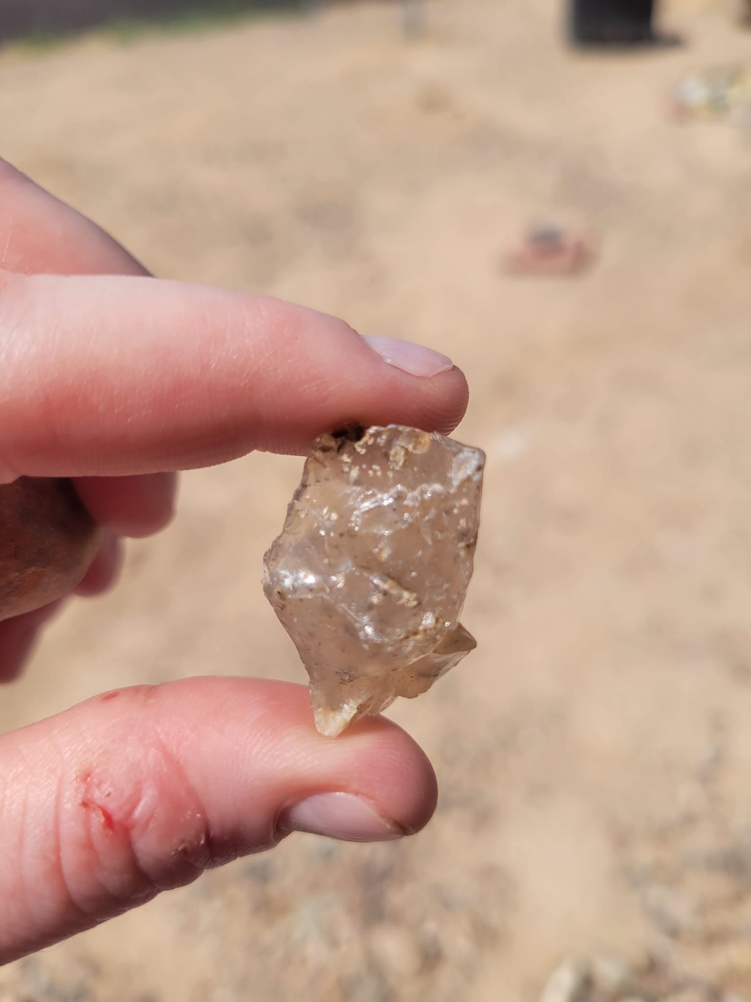 What type of rock is this iron-stained quartz with agate inclusions?
