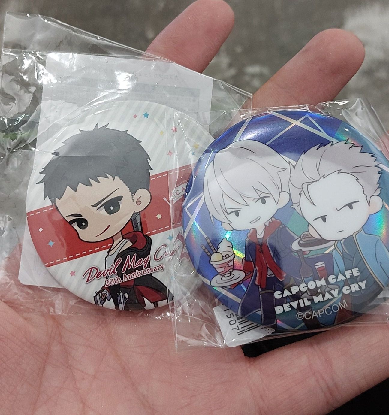 Official Devil May Cry merchandise pins available at Capcom Cafe
