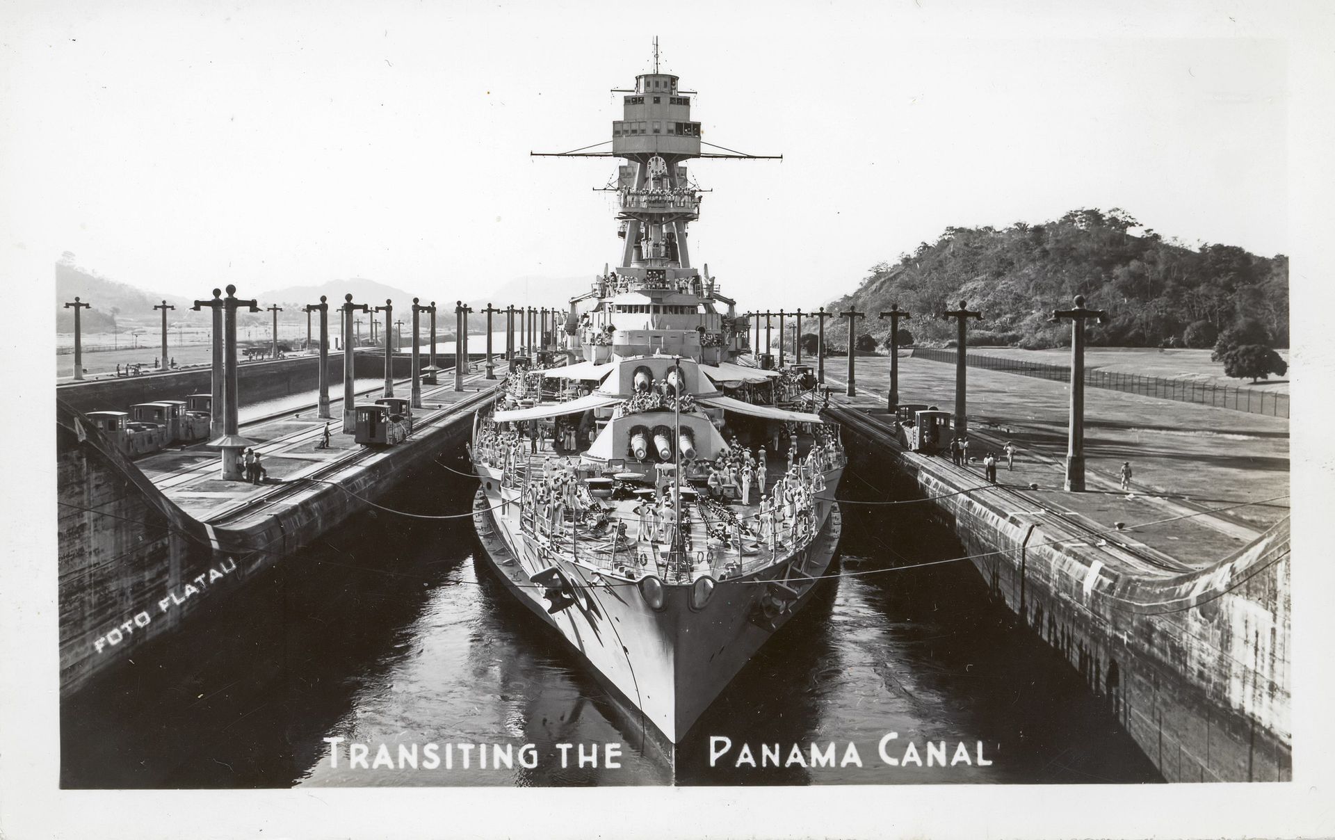 A look back to USS Oklahoma City CLG-5 making a tight turn to port