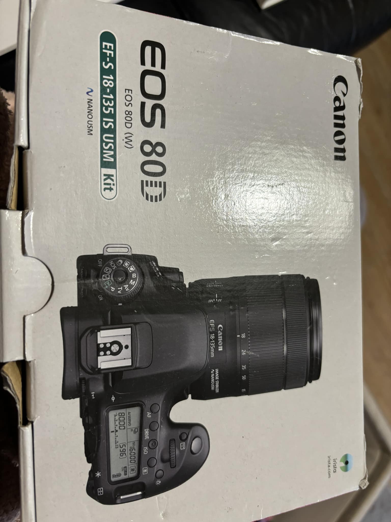 What wide angle lens is recommended for a Canon 80D?
